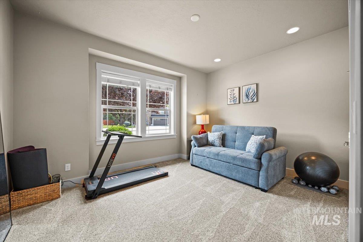 Exercise area featuring carpet and recessed lighting