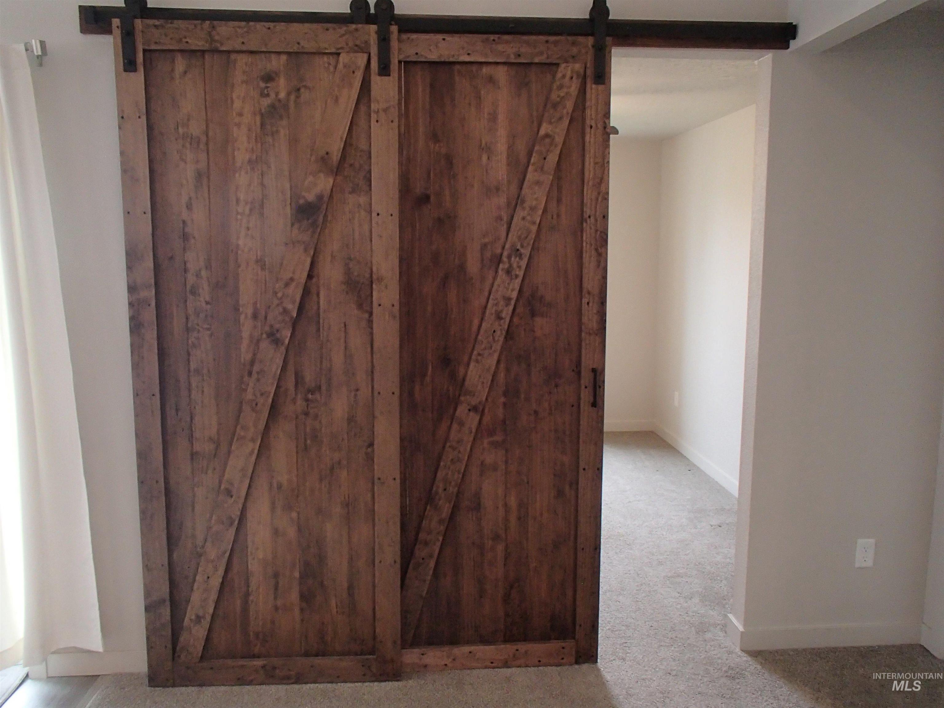 Barn style door to add privacy to bonus room/Office