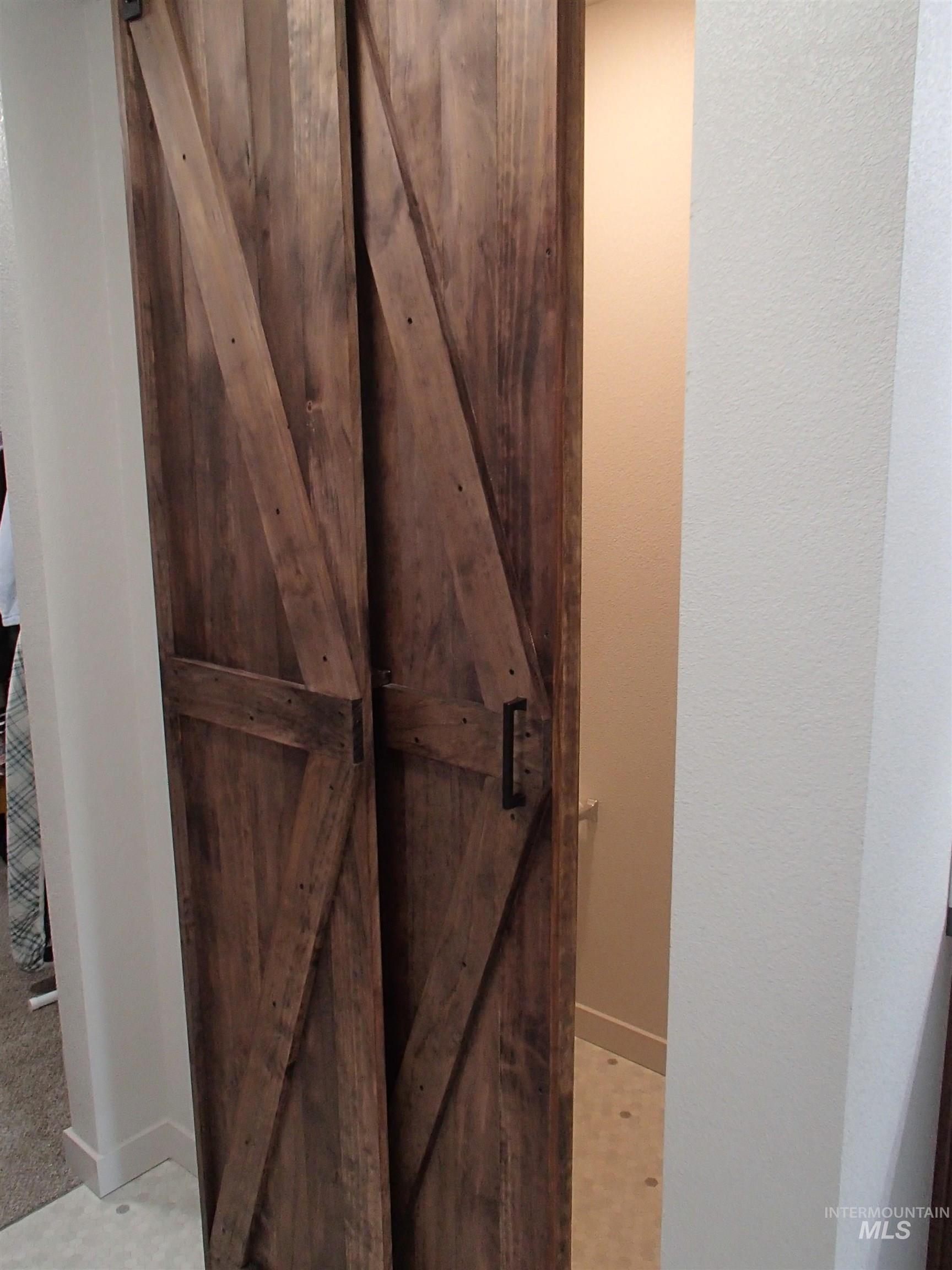 Custom Barn Door in Primary Bathroom