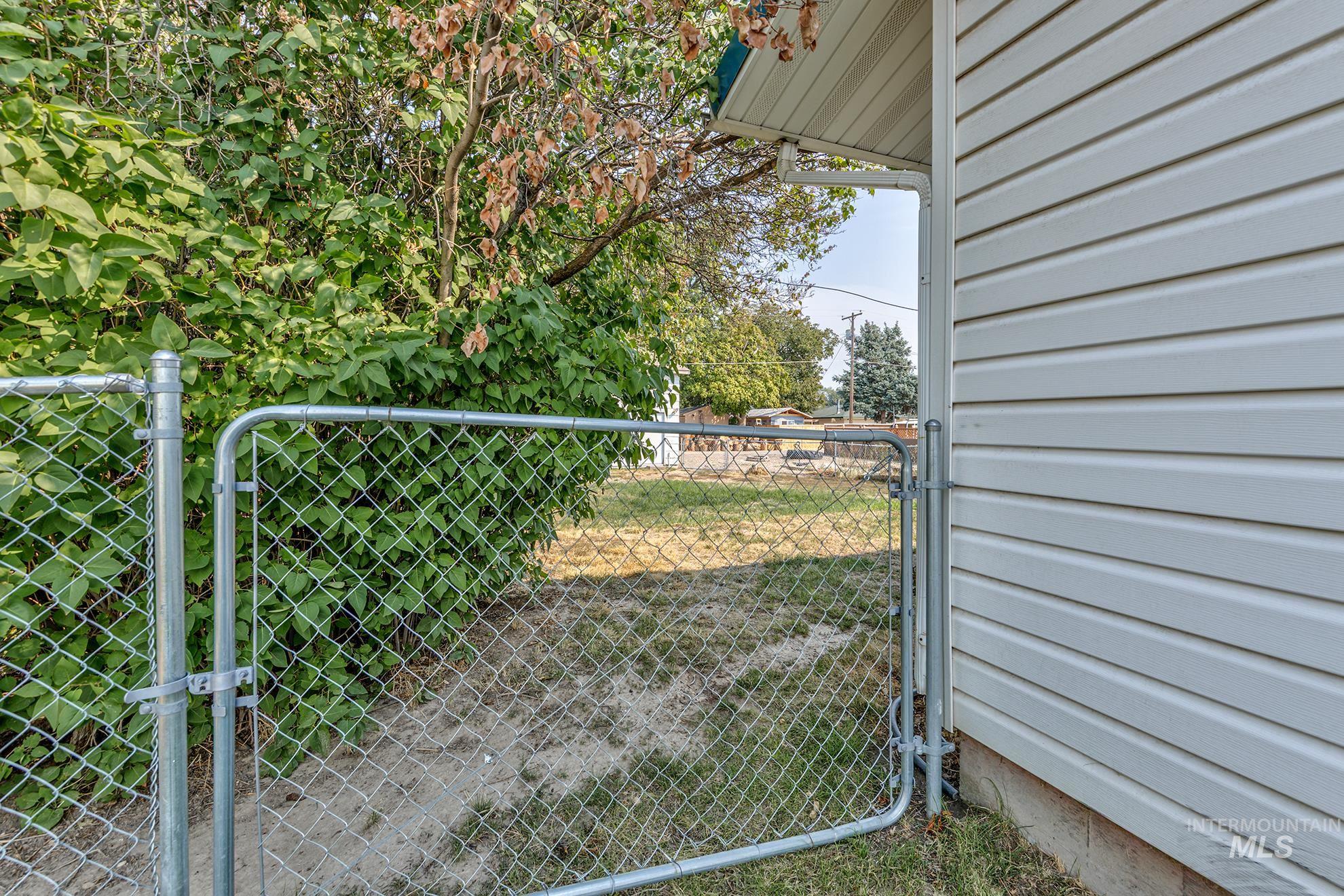 View of yard featuring a gate