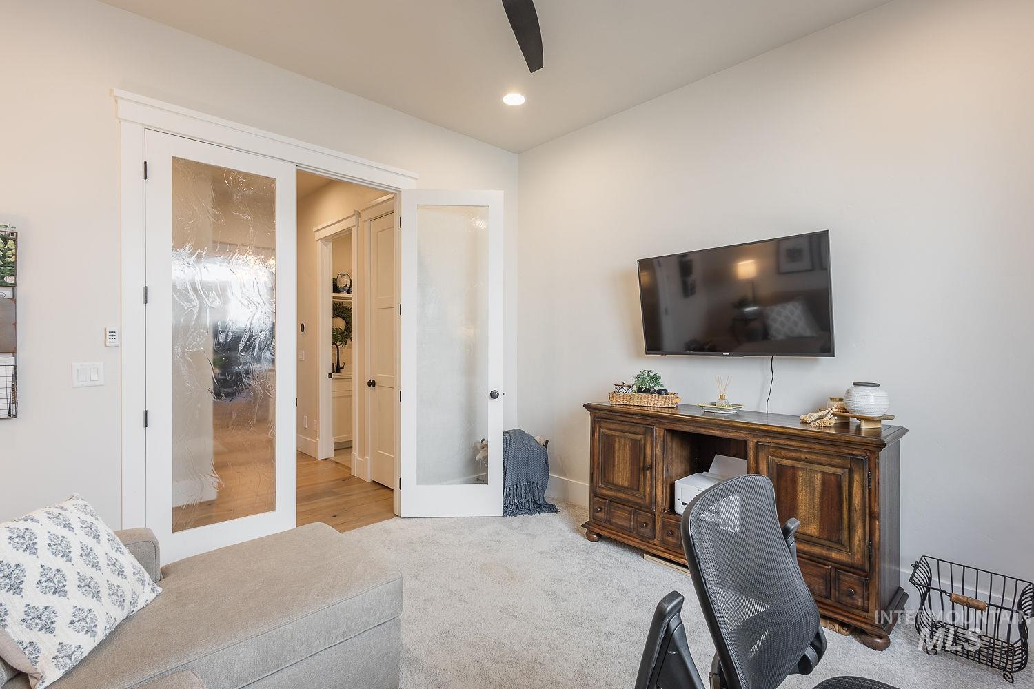 Office with french doors, a ceiling fan, recessed lighting, and carpet floors
