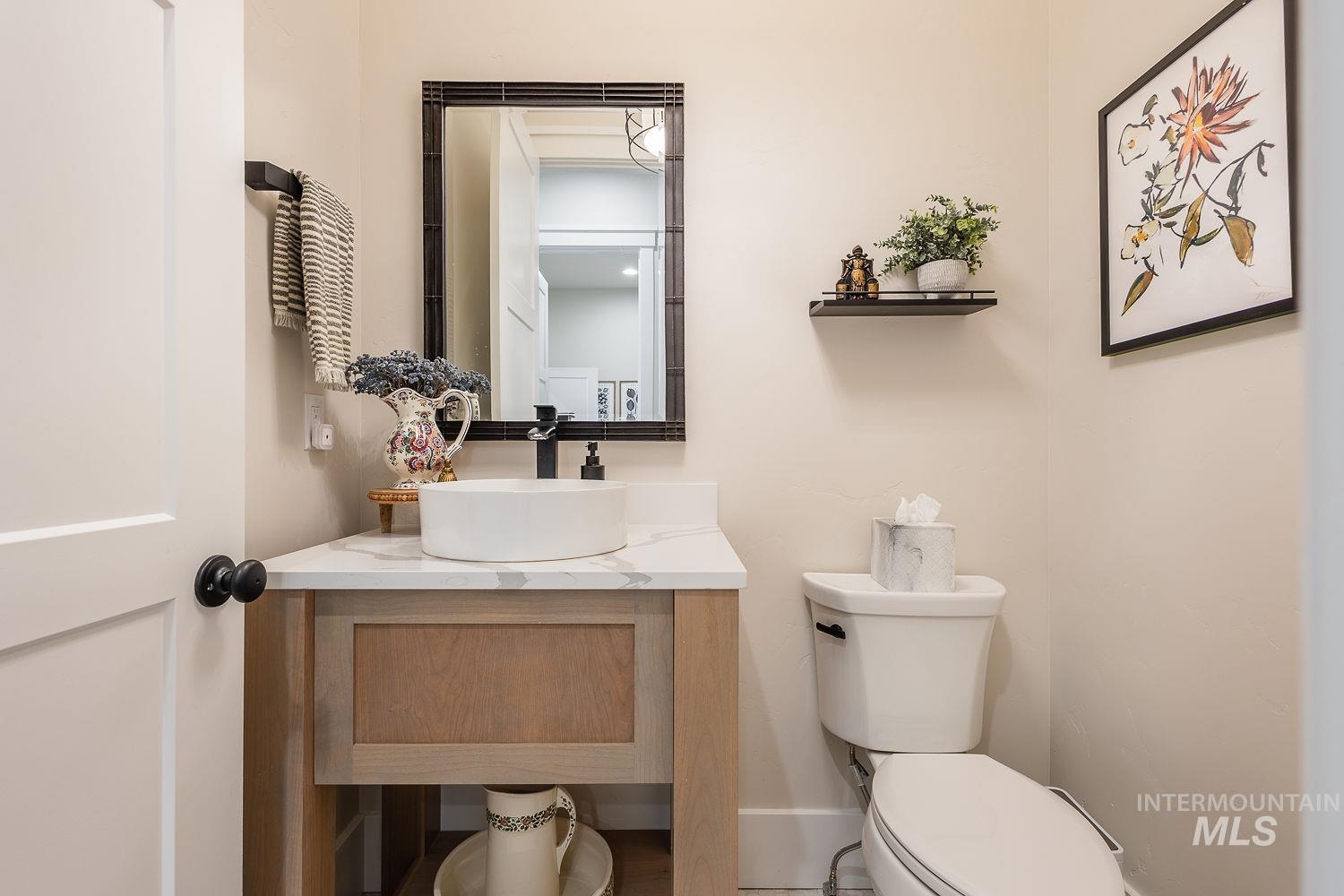 Bathroom with toilet and vanity
