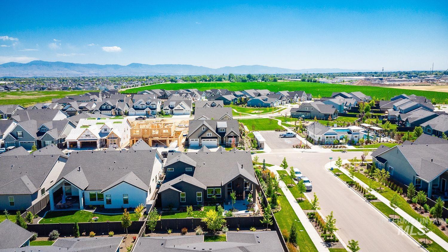 Aerial perspective of suburban area with mountains