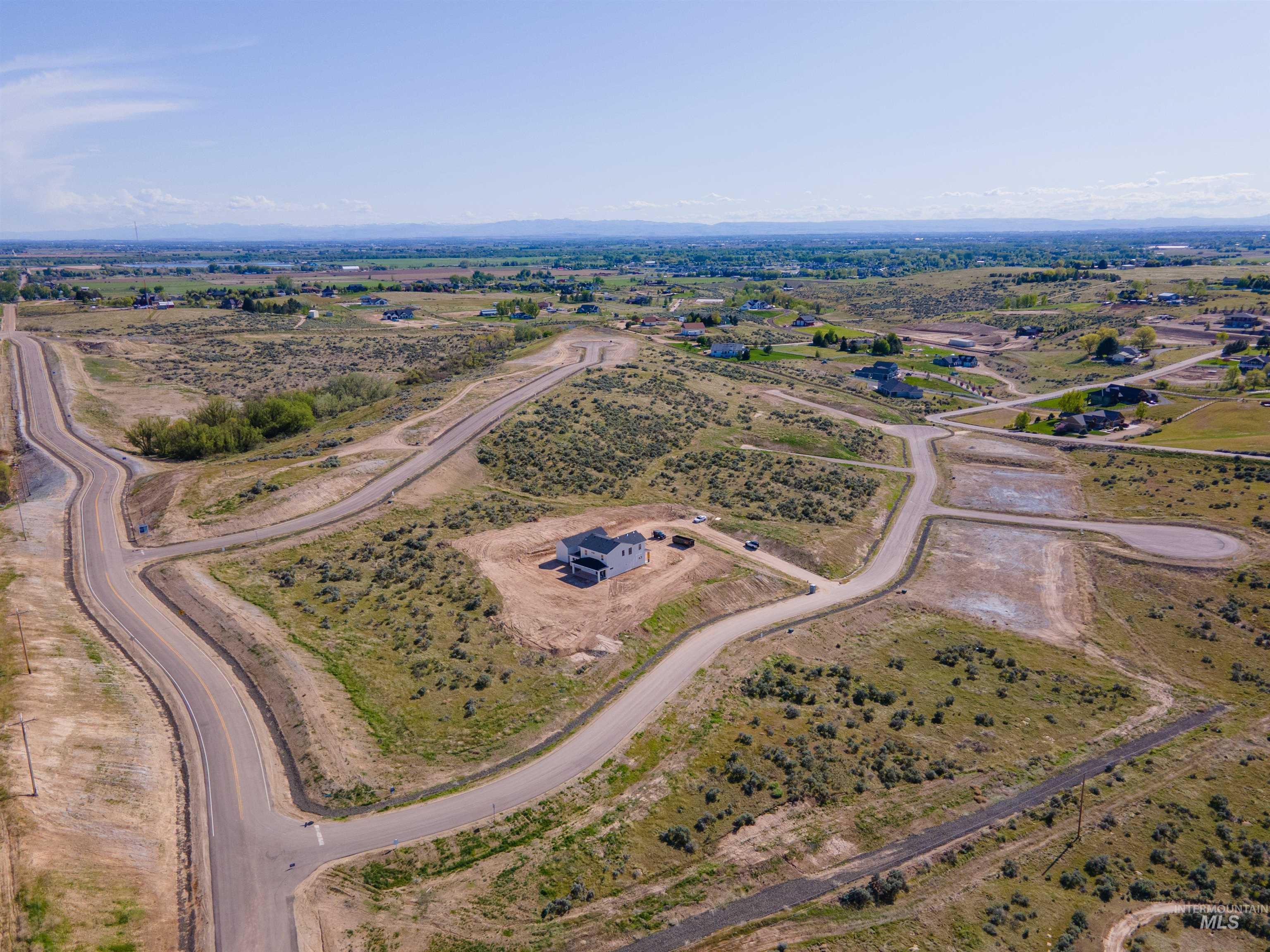 Aerial view of property's location with rural landscape