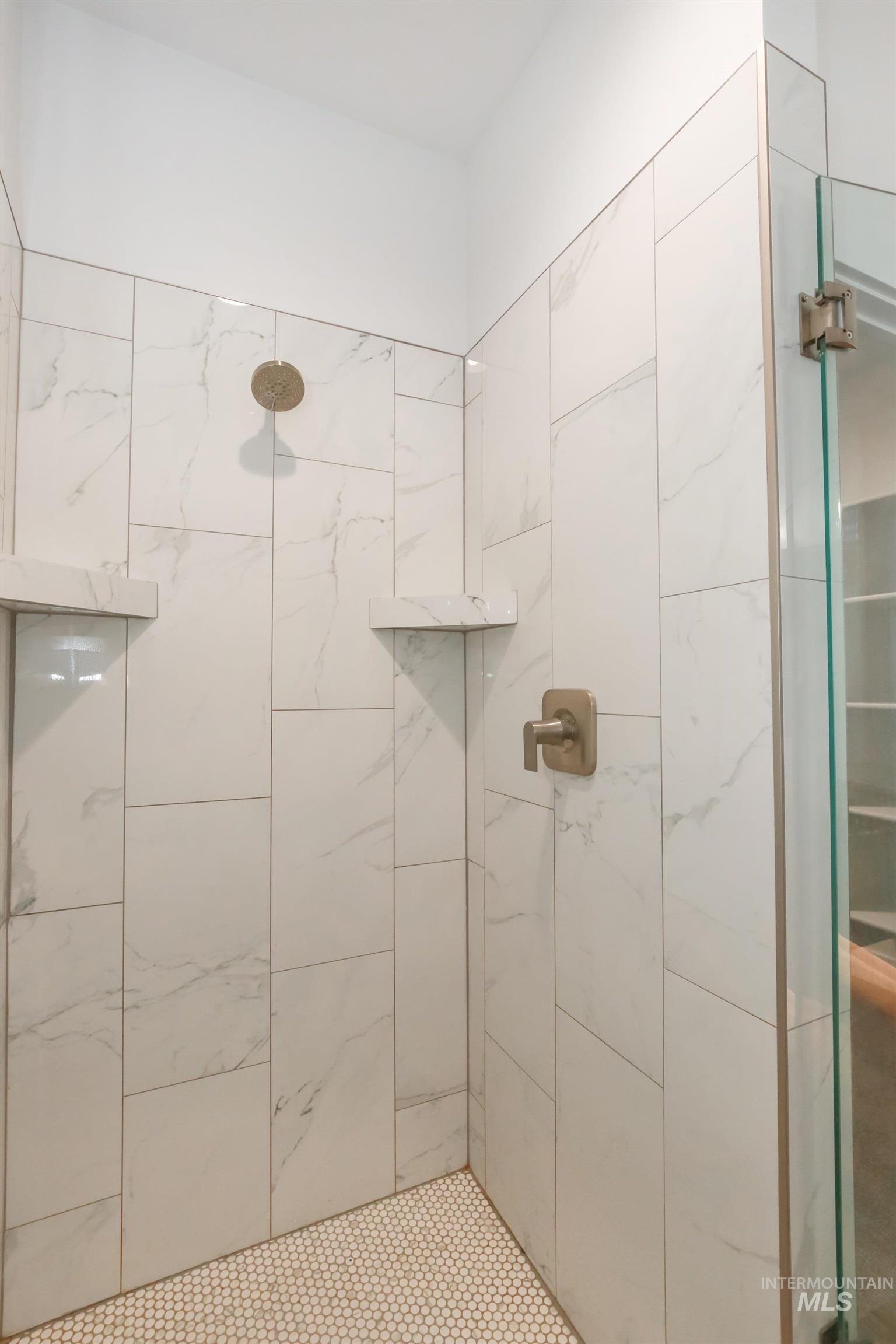 Full bath featuring a stall shower