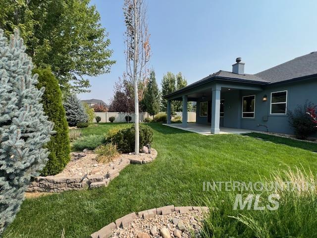 View of yard with a patio area