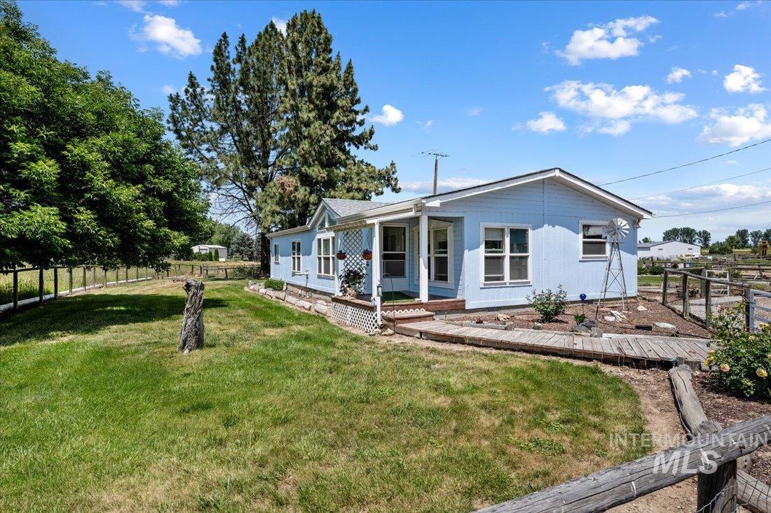 View of front of house featuring a deck