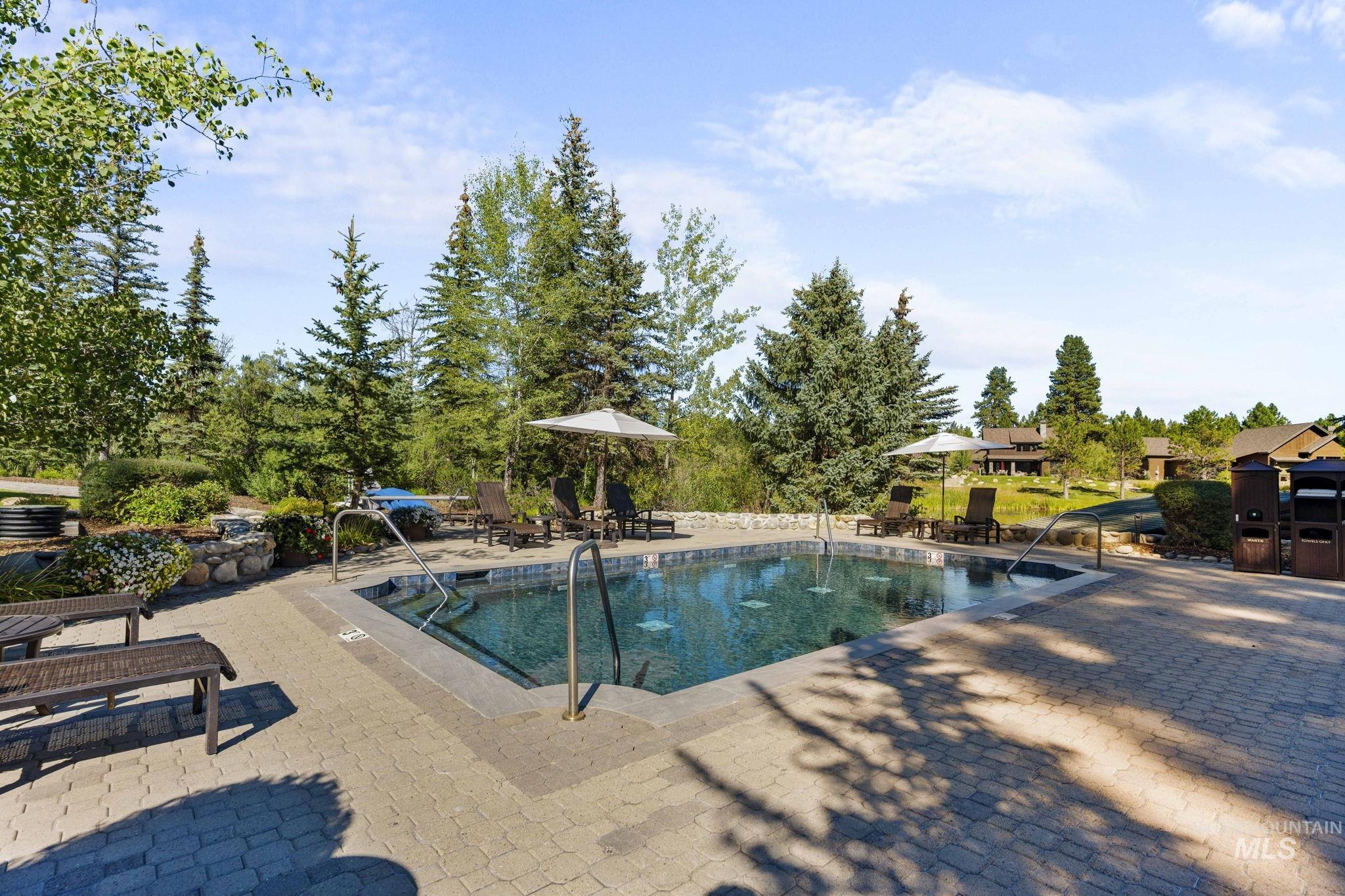 Swimming pool with a patio