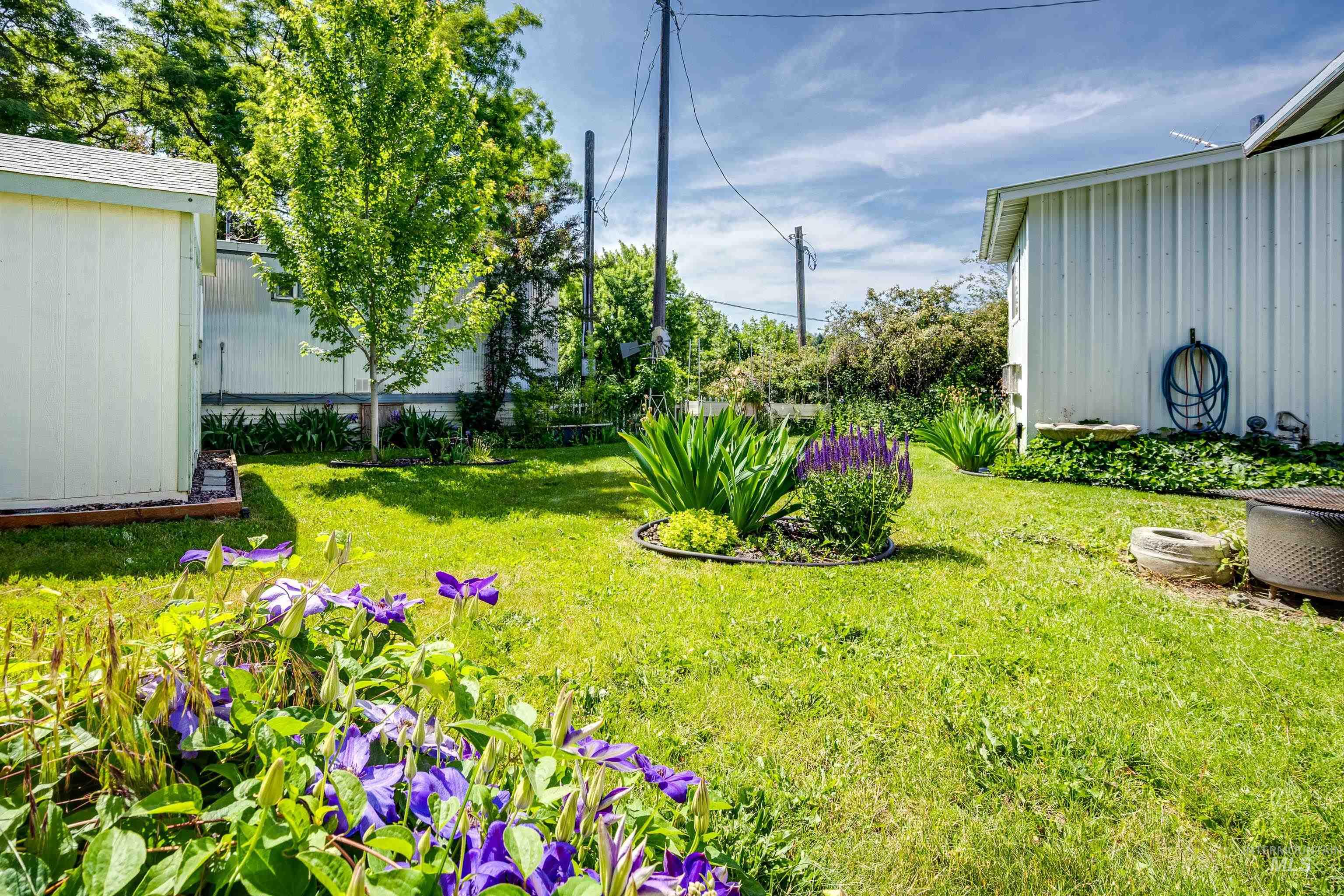 View of yard with an outdoor structure
