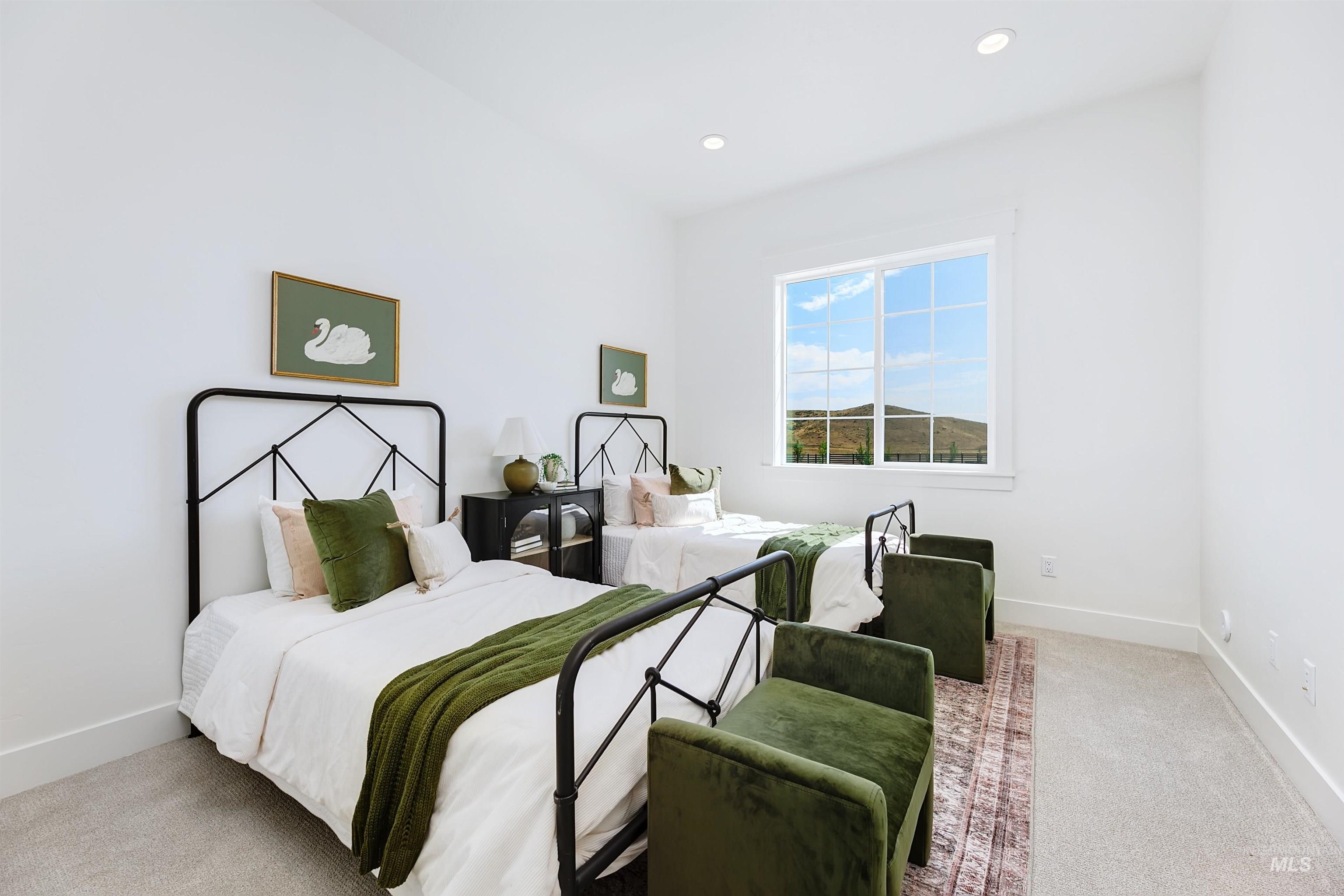 Bedroom featuring light colored carpet and recessed lighting