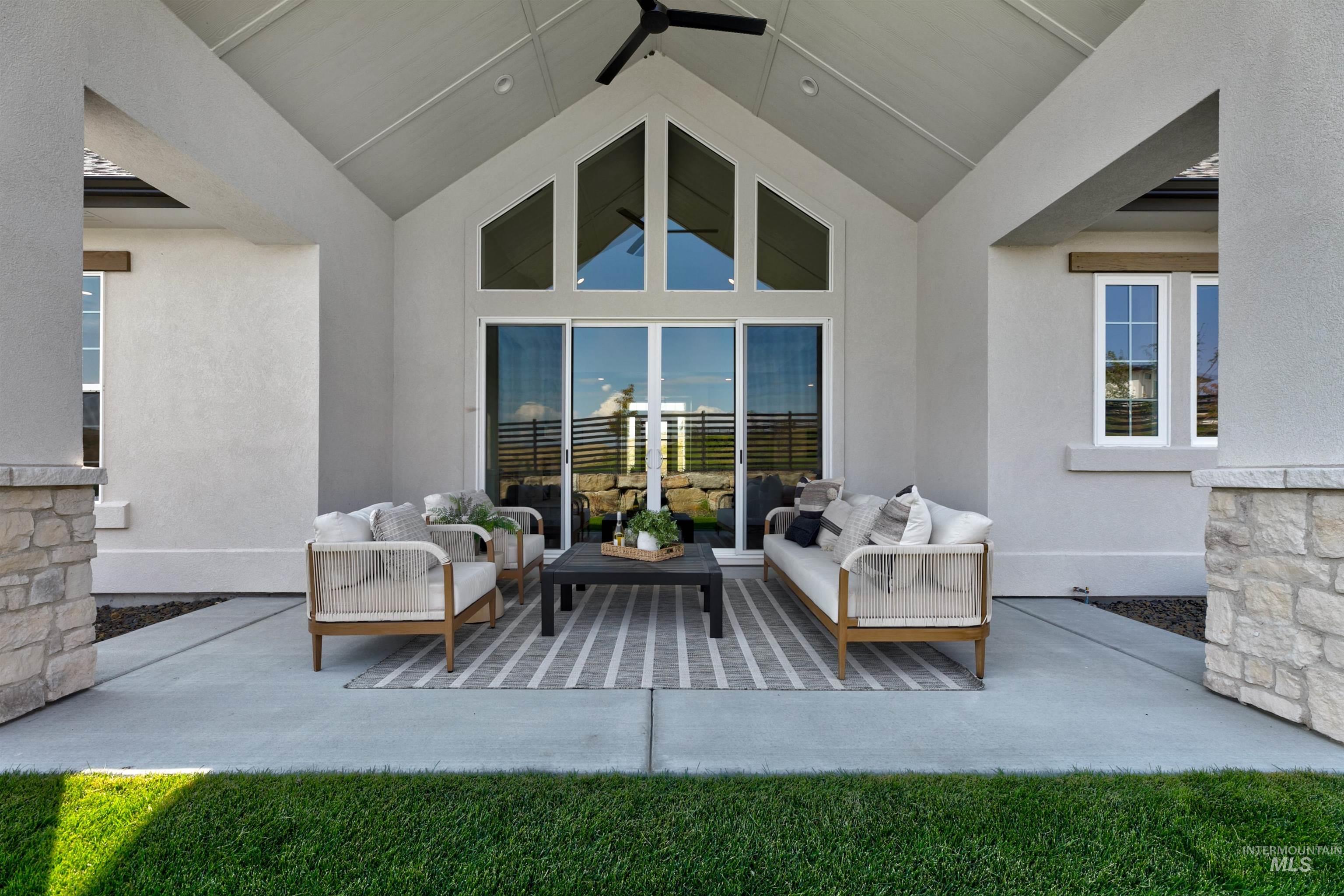 View of patio / terrace featuring a ceiling fan and outdoor lounge area