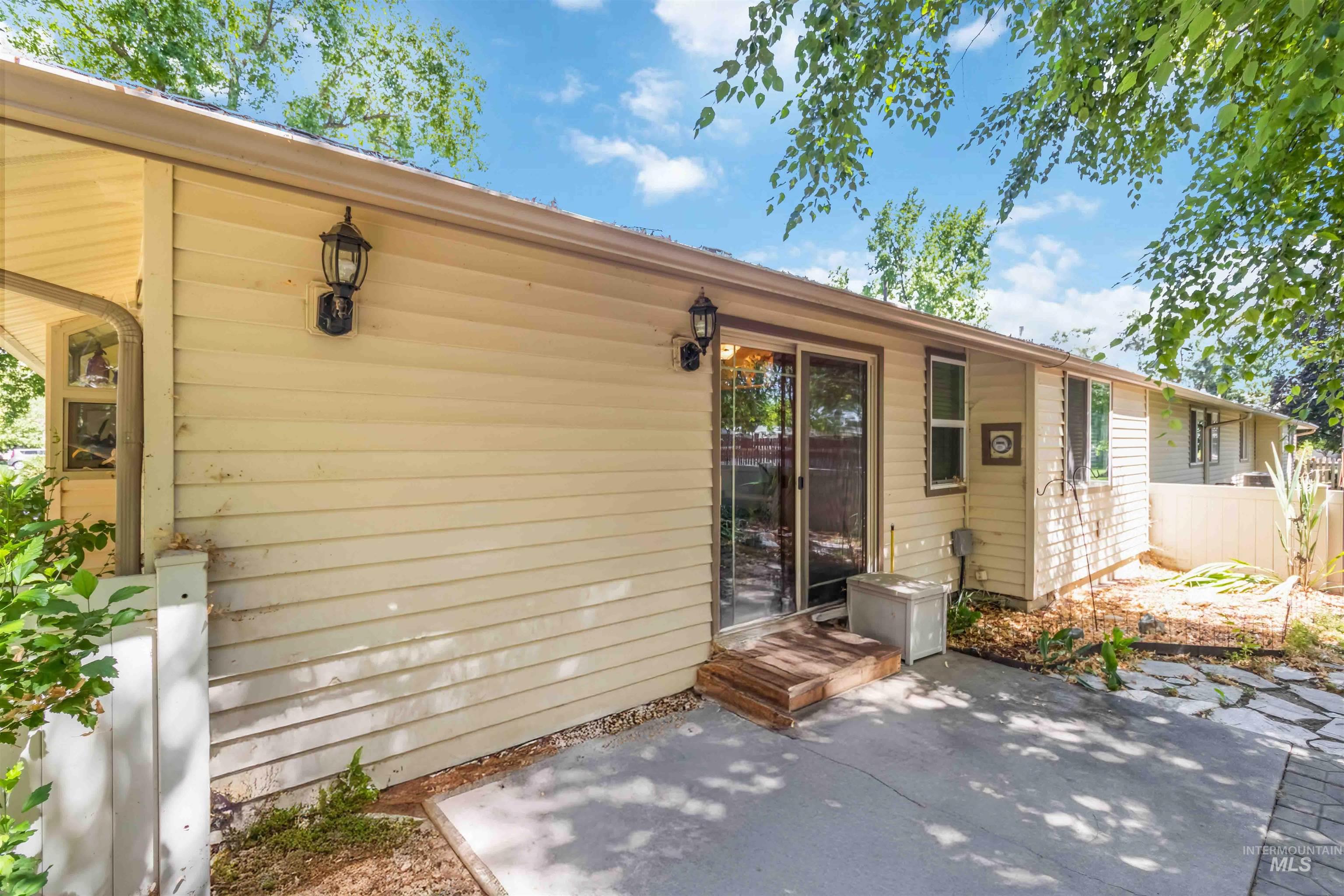 Back slider featuring a patio area with full vinyl fencing and no back neighbors.