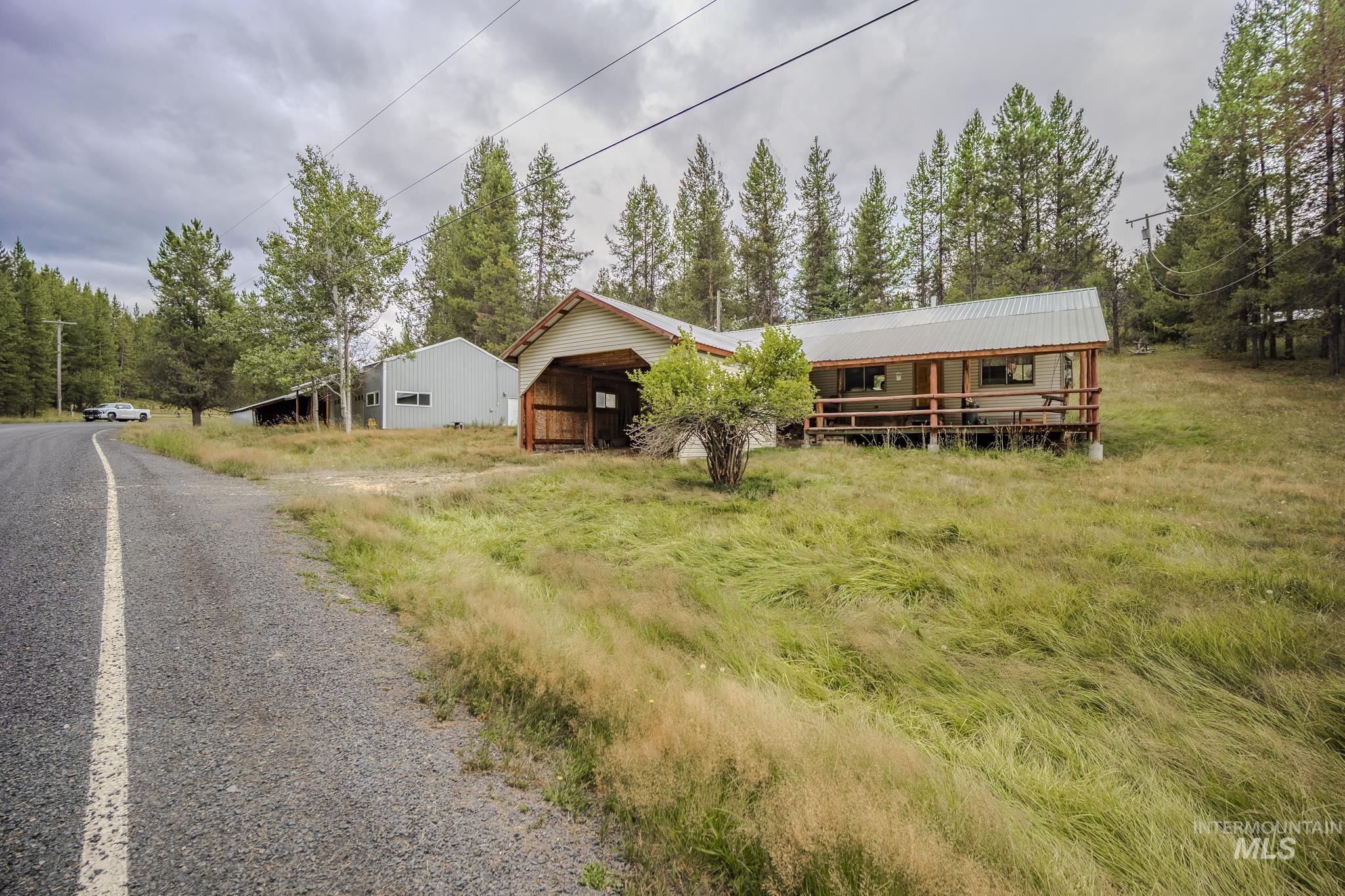 View of front of home featuring a metal roof