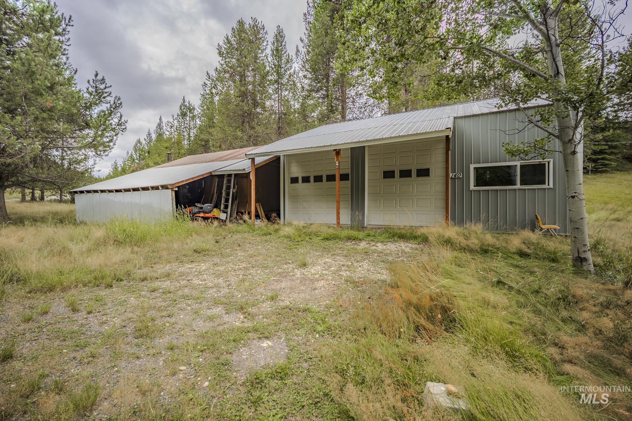 View of pole building featuring a garage