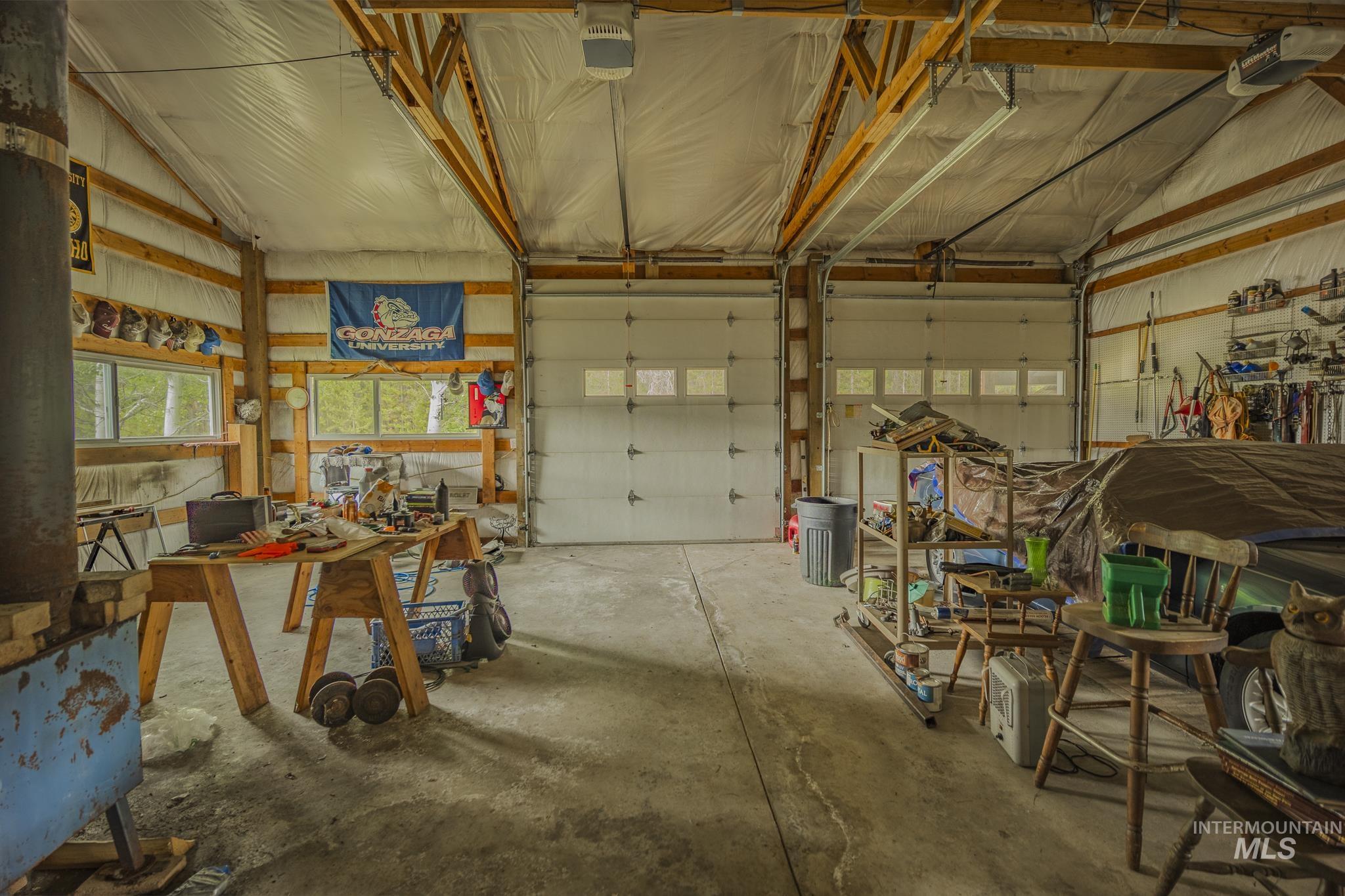 Garage featuring a garage door opener