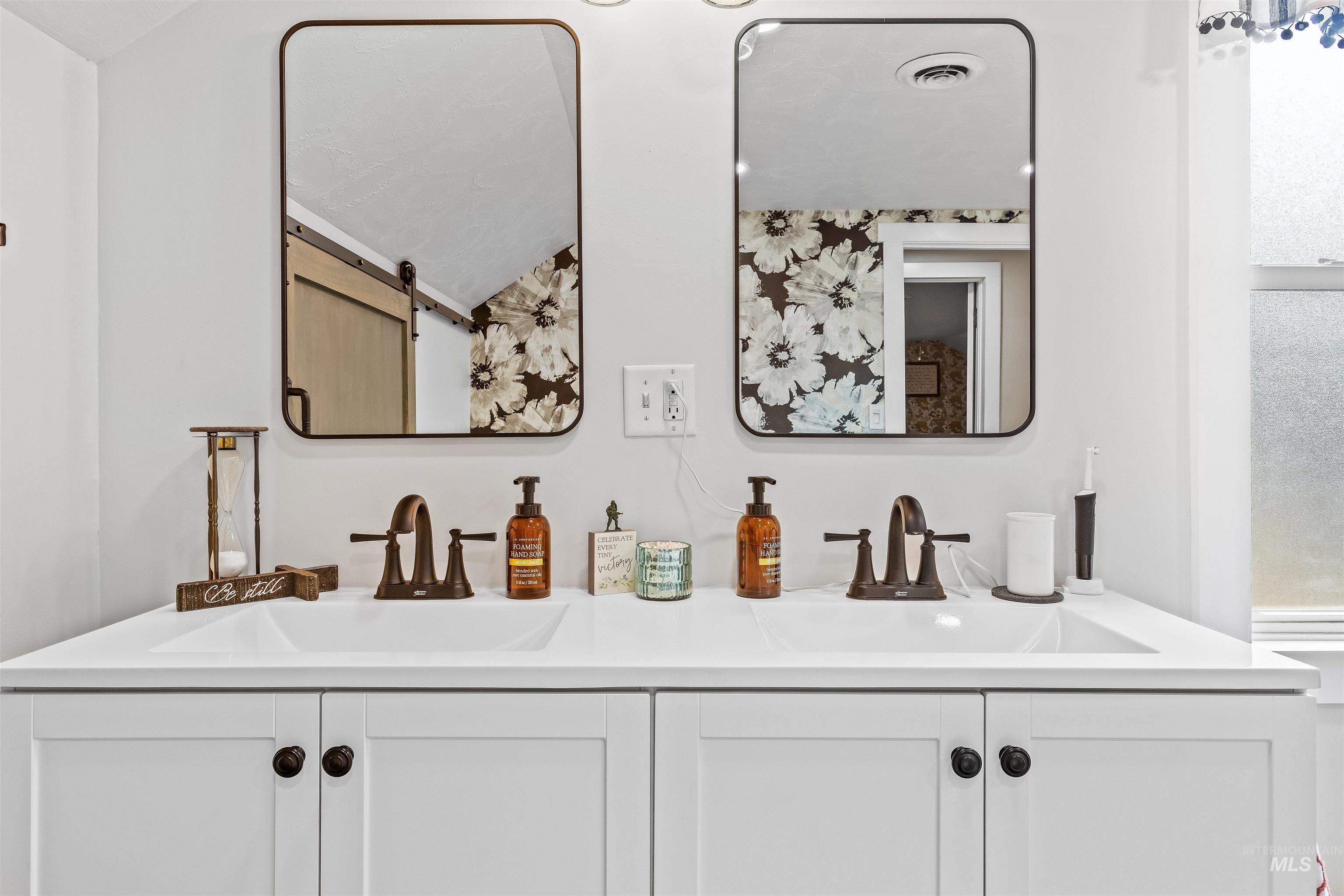 Full bathroom with double vanity