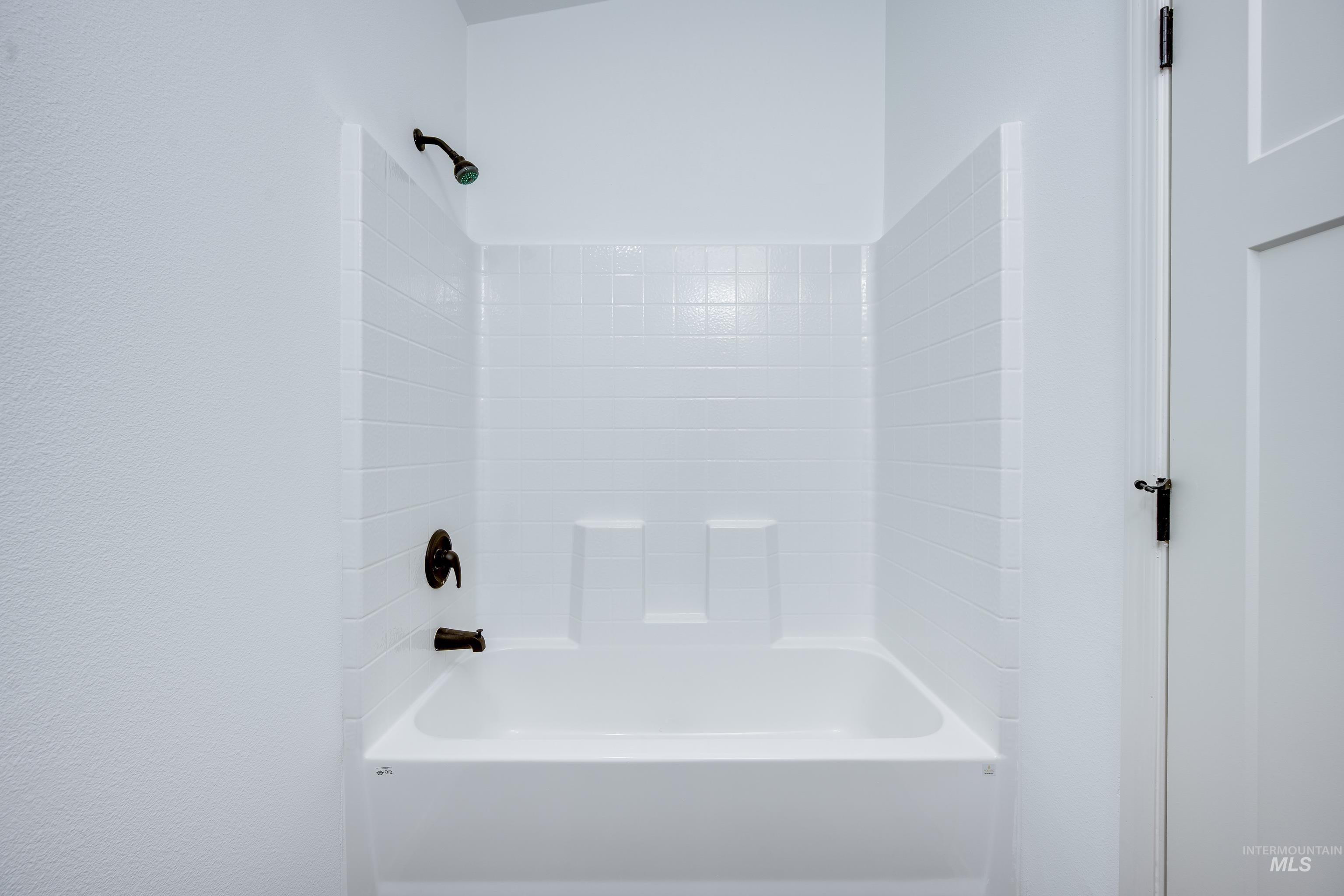 Full bathroom featuring shower / tub combination
