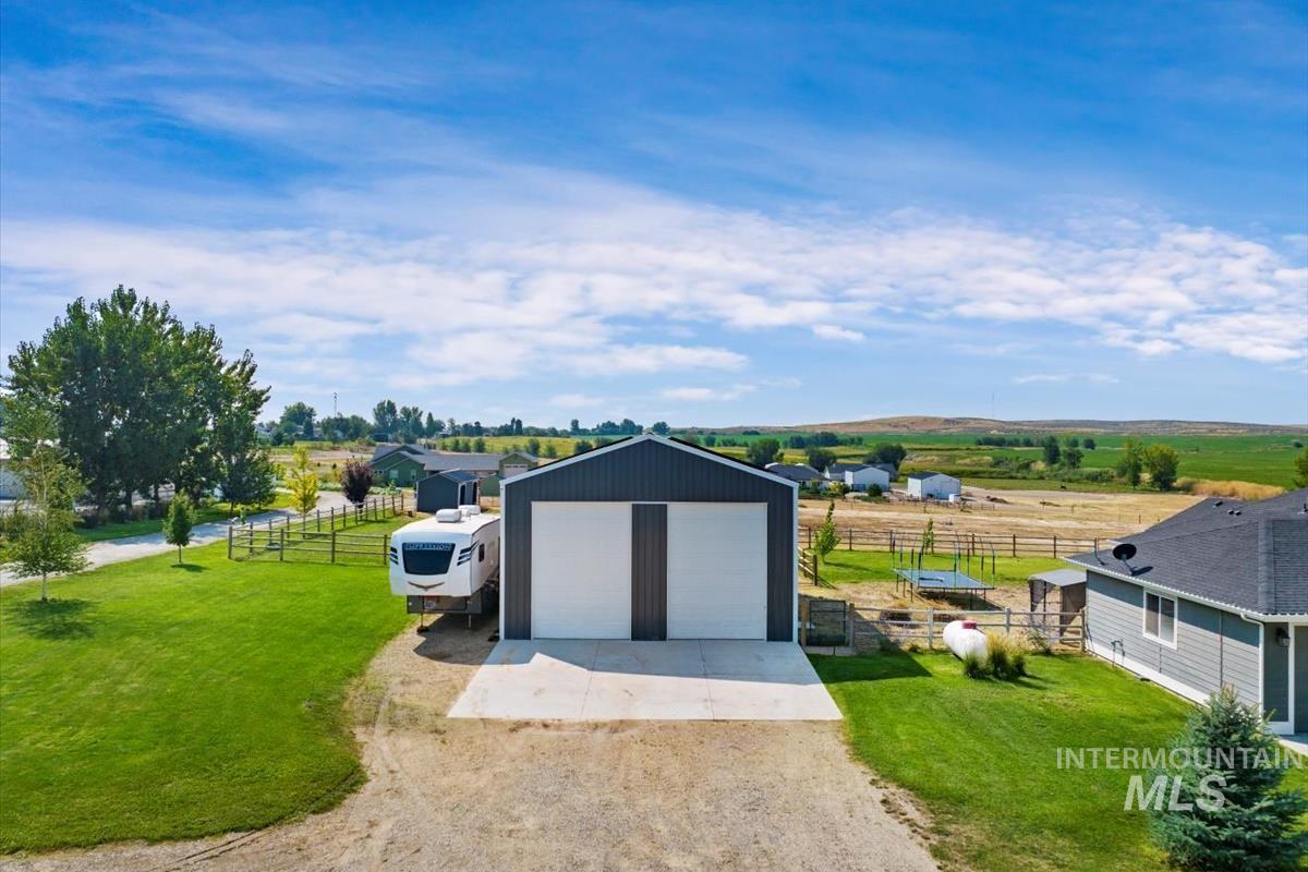 View of outdoor structure with a view of rural / pastoral area