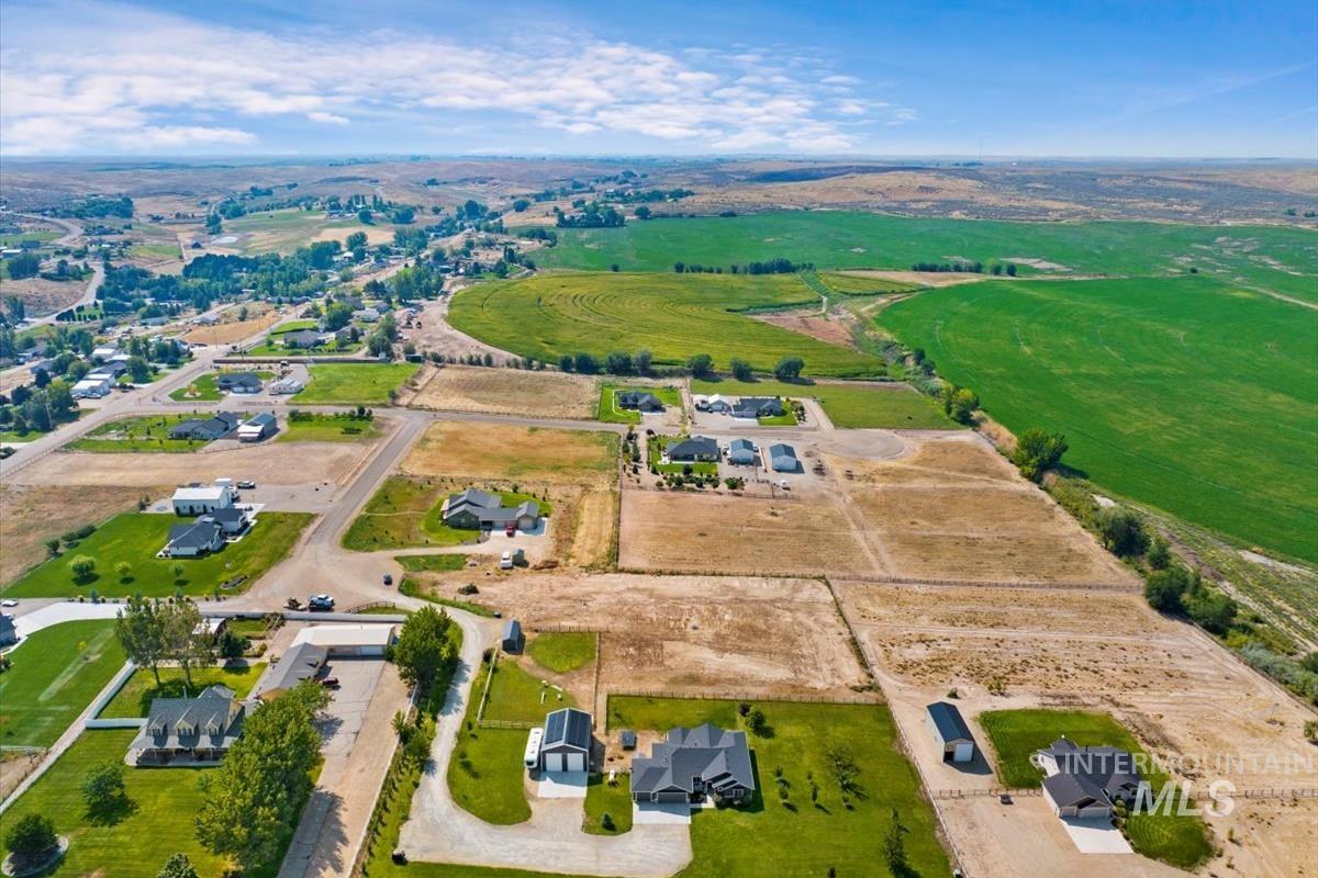 Aerial view of property's location featuring rural landscape