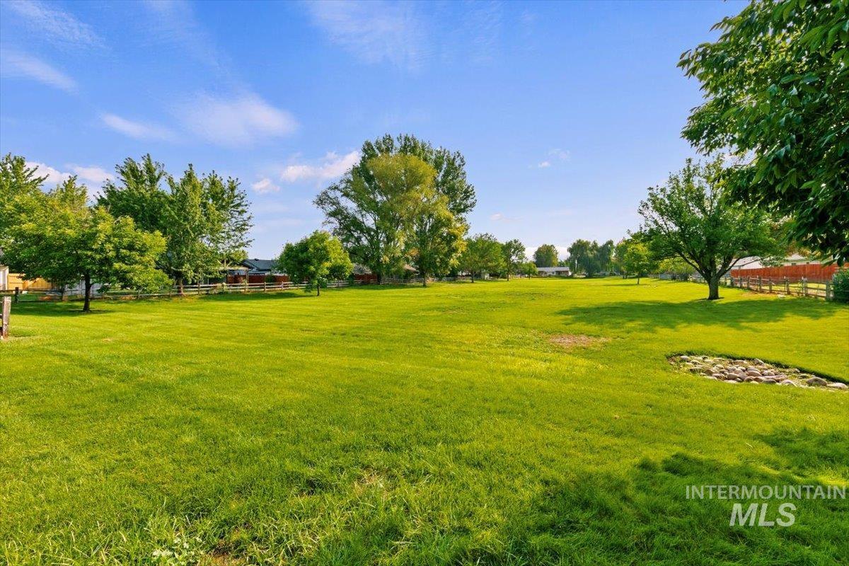 View of yard featuring a view of rural / pastoral area