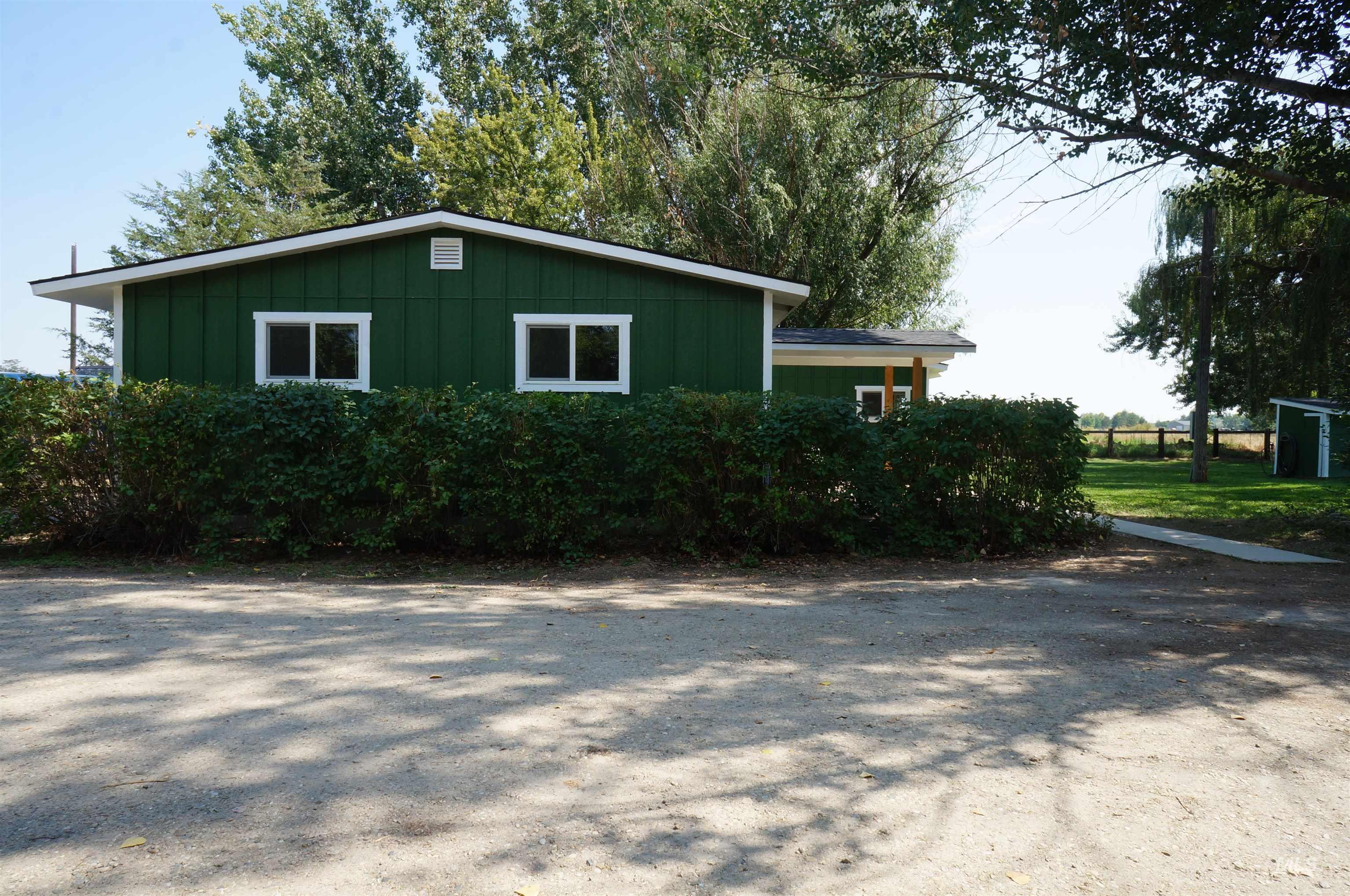 View of property exterior with board and batten siding