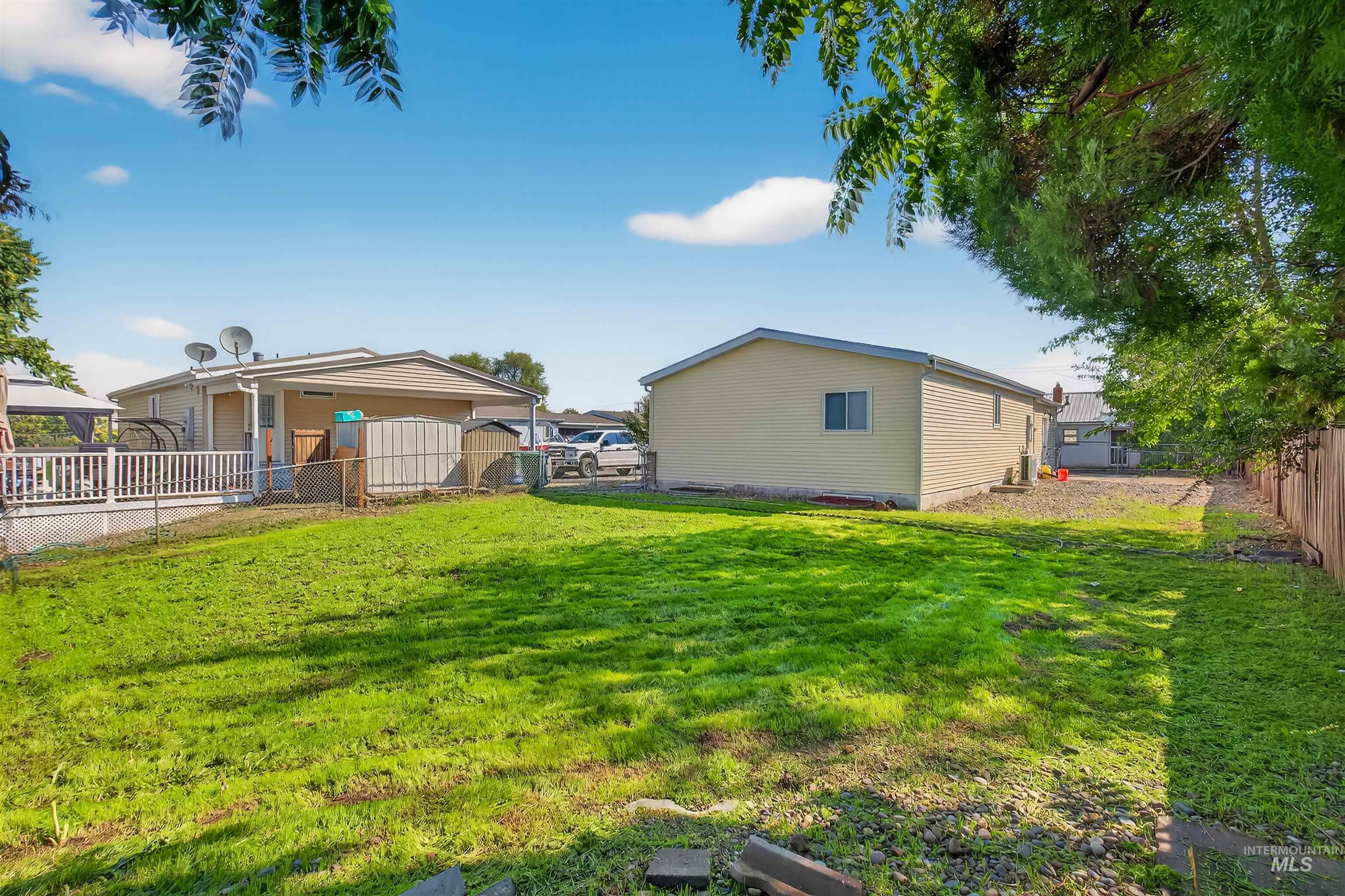 View of fenced backyard