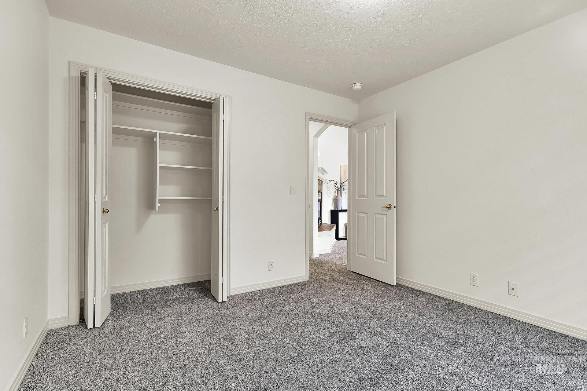 Spacious closet with built in shelving