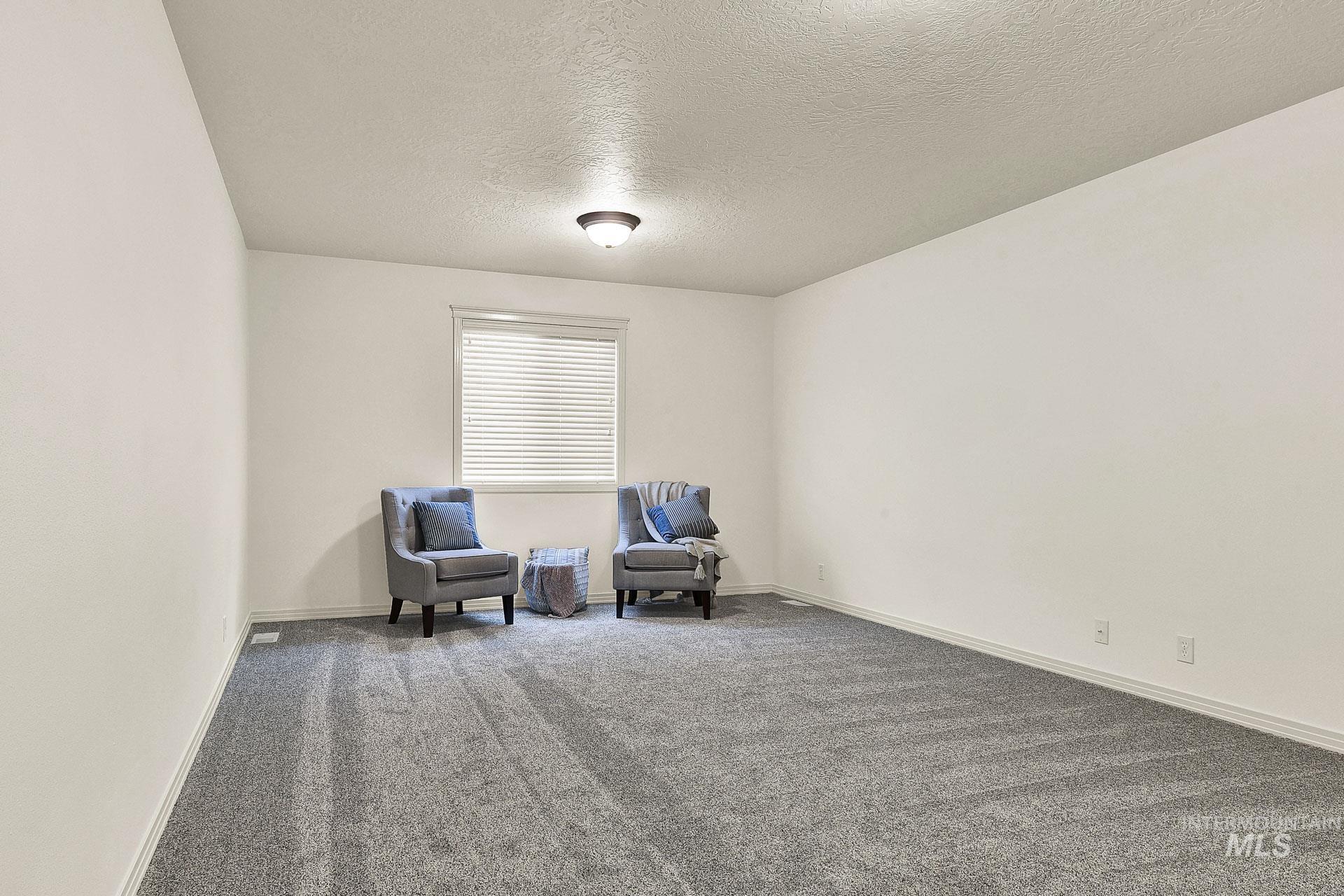 Family room, media room or office. Add a closet here and make it a 4th bedroom! Newly installed carpet and fresh paint!