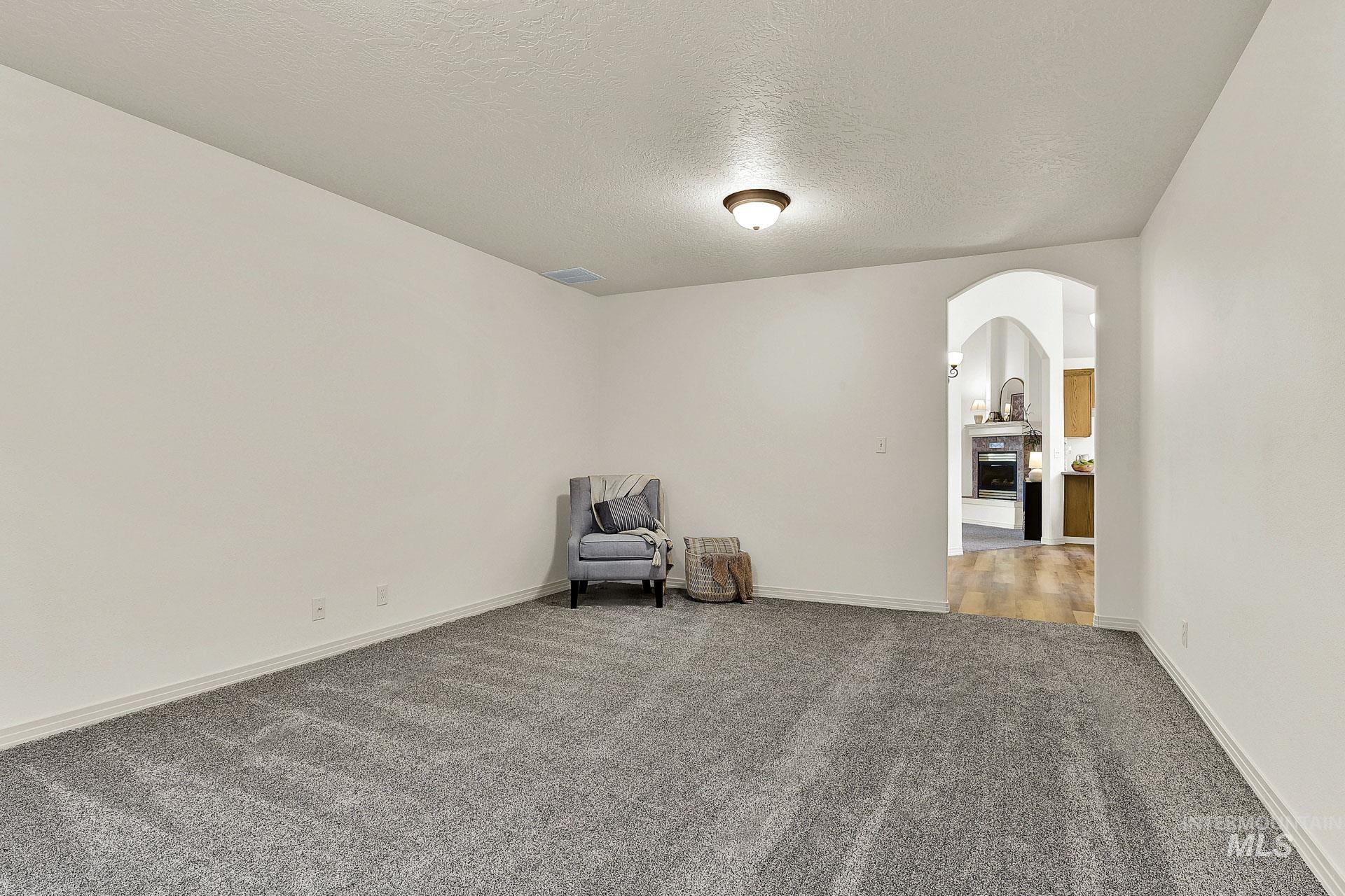 Family room, media room or office. Add a closet here and make it a 4th bedroom! Newly installed carpet and fresh paint!