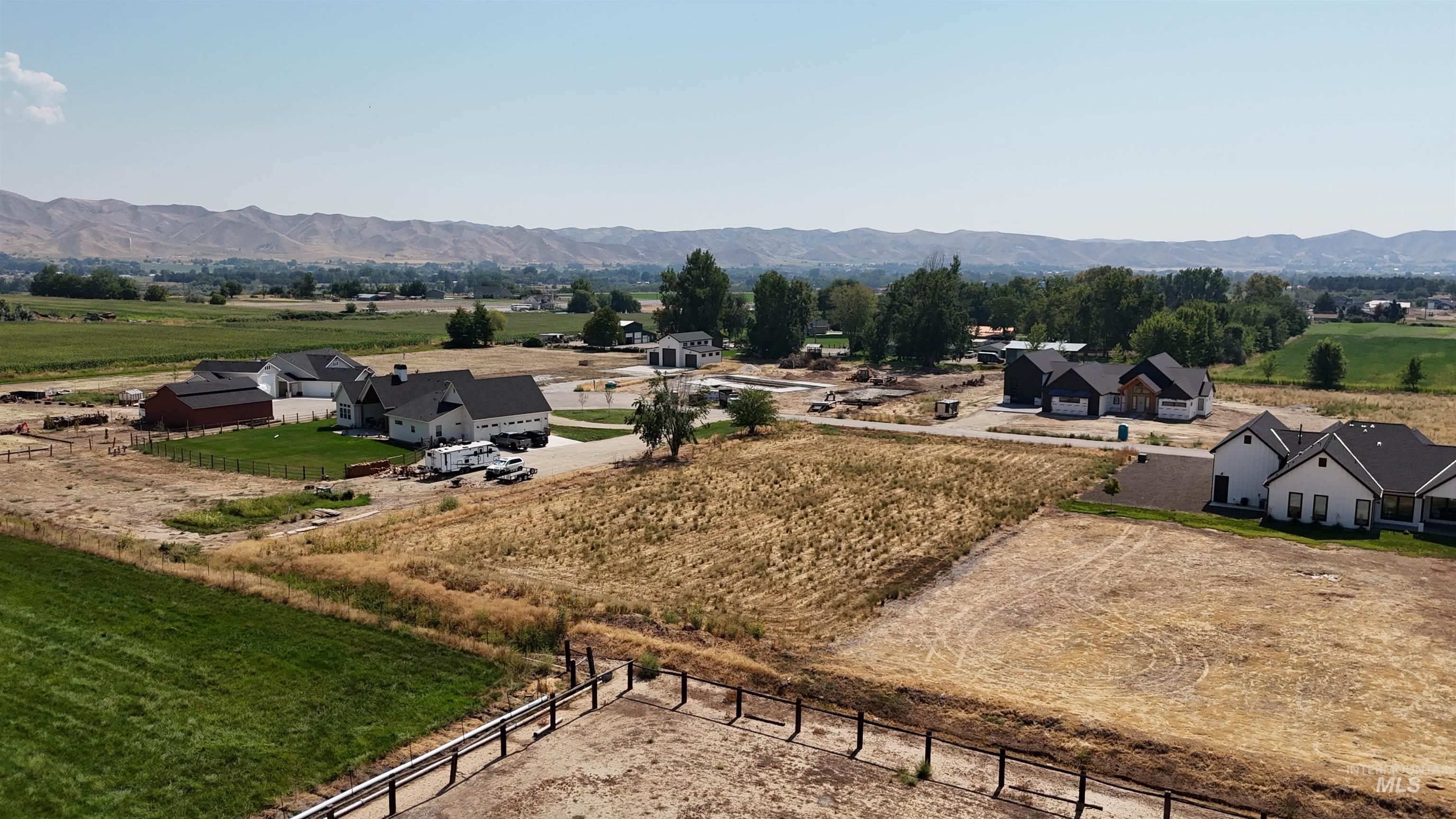 Overview of rural landscape with a mountainous background