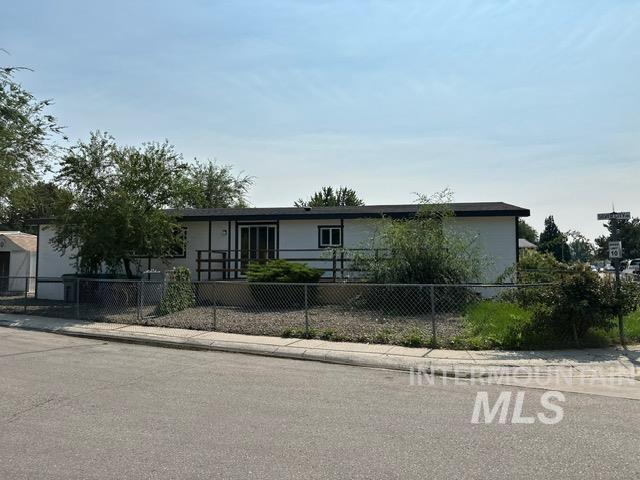View of front of property featuring a fenced front yard