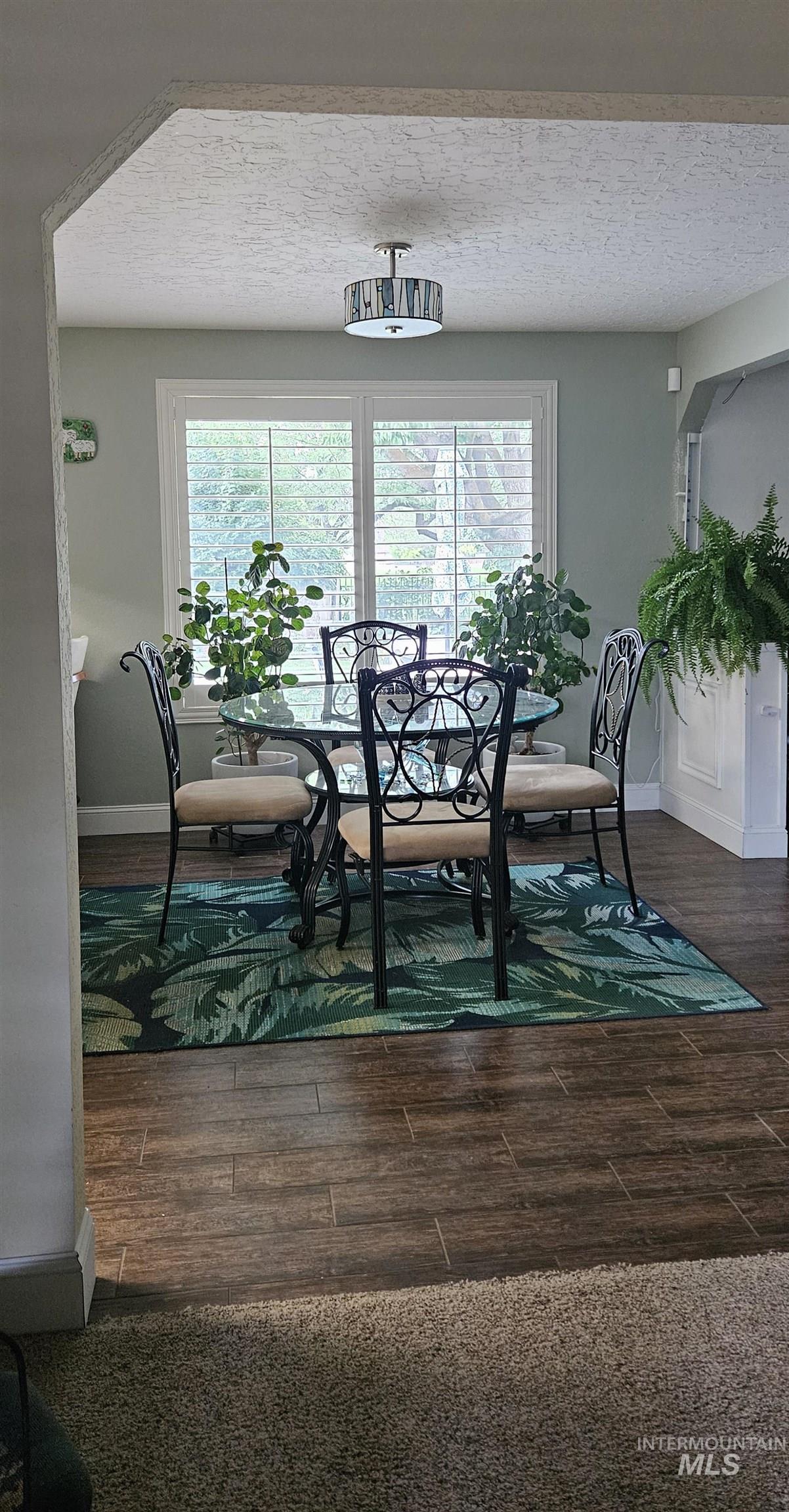 Dining area featuring wood finished floors, lot of natural light. Enjoy a 