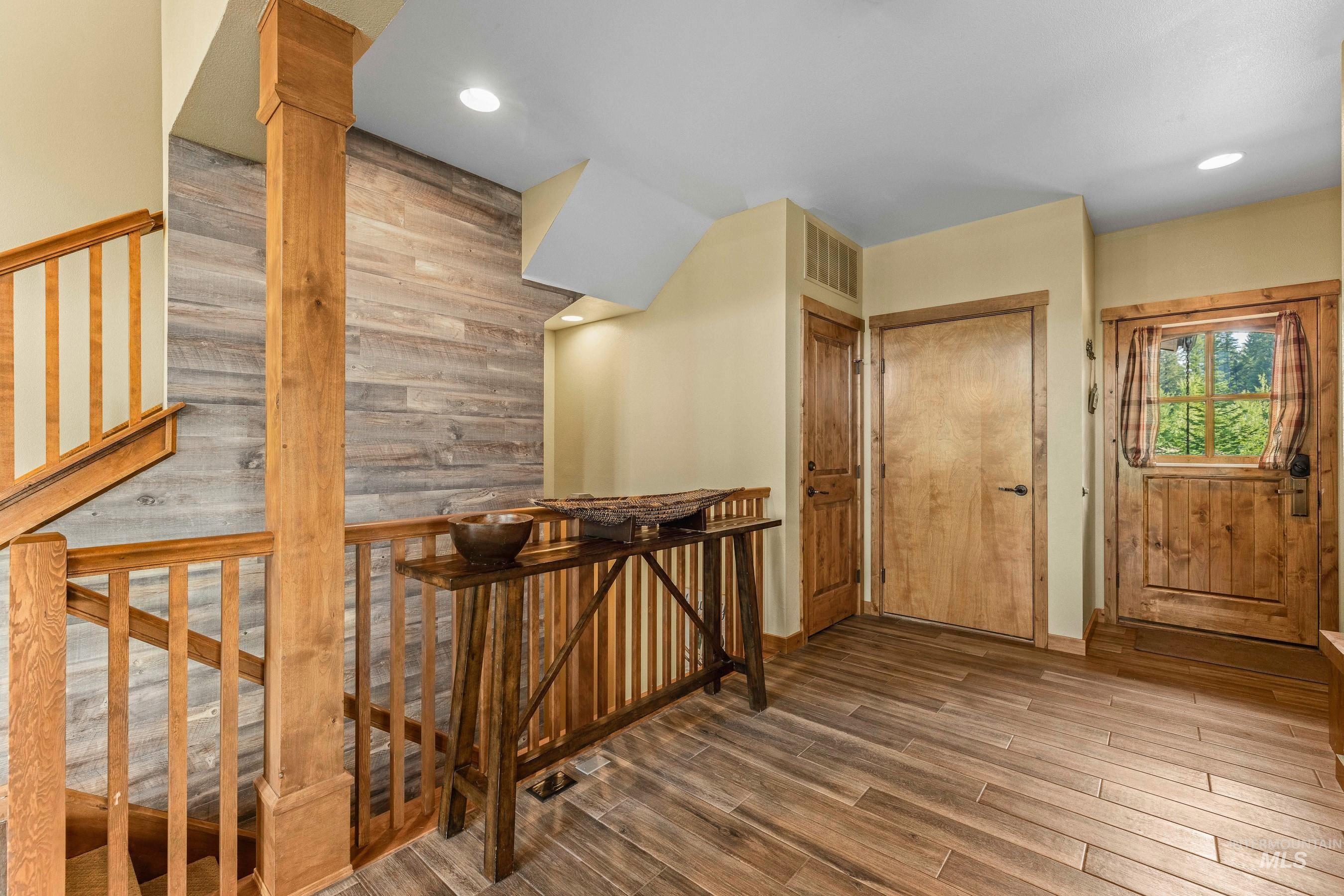 Staircase featuring new carpet and recessed lighting
