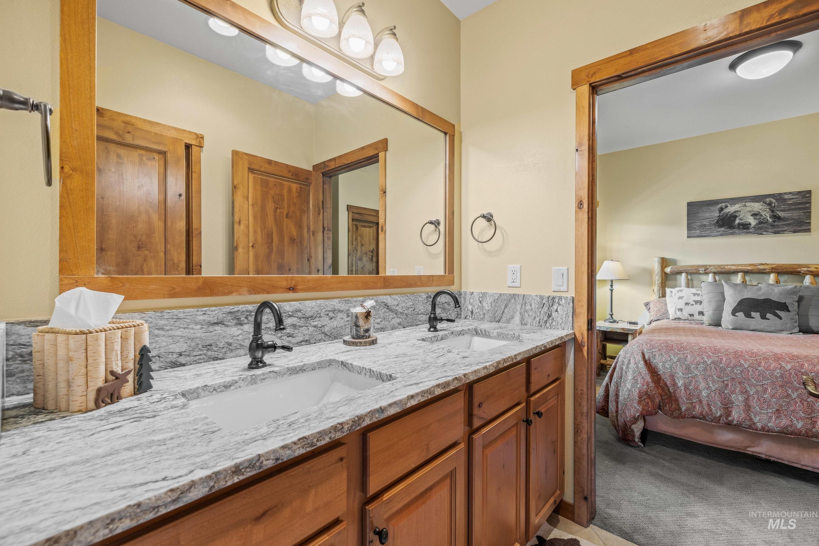 Jack & Jill bathroom featuring double vanity