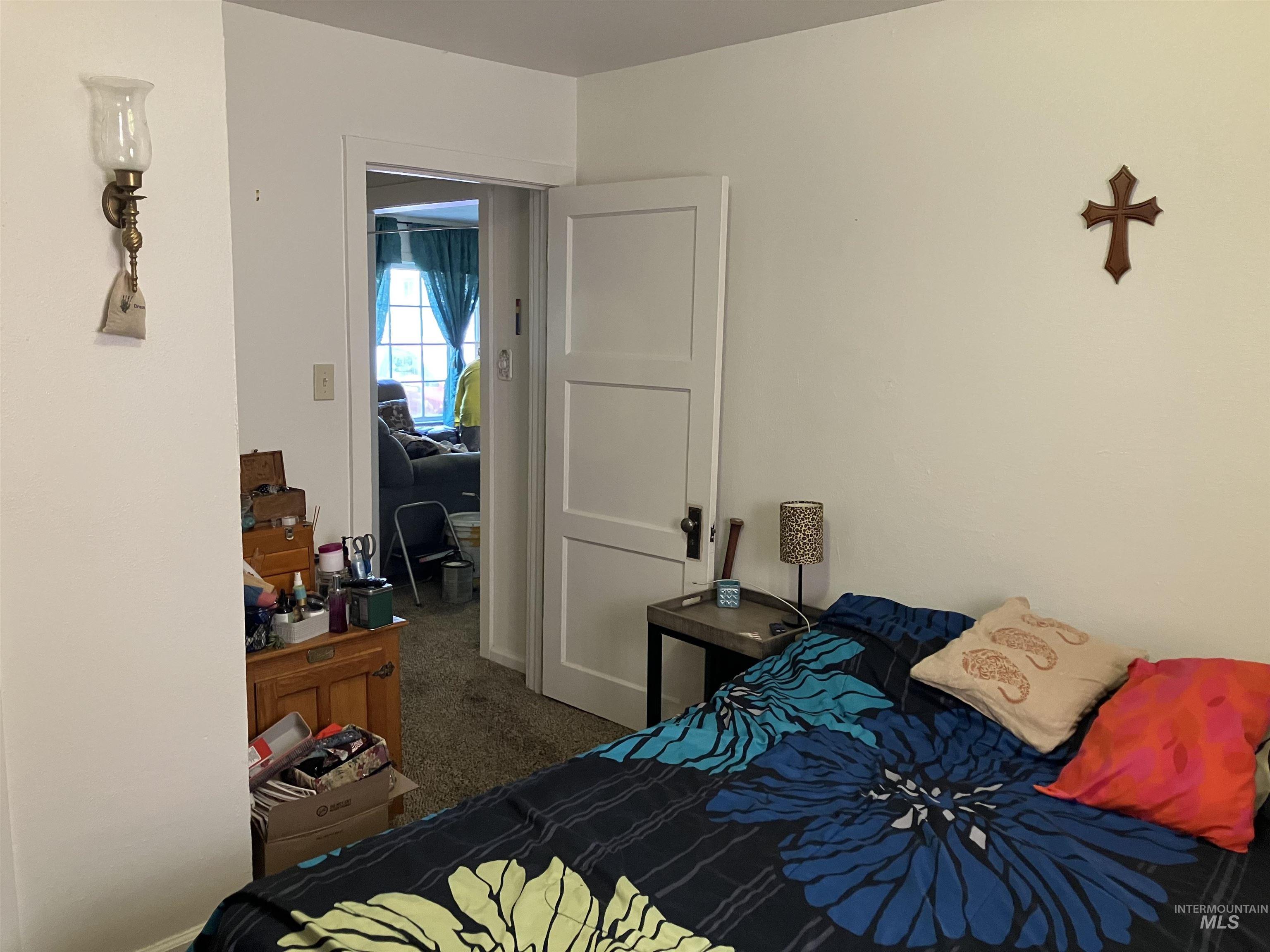 Bedroom with dark carpet