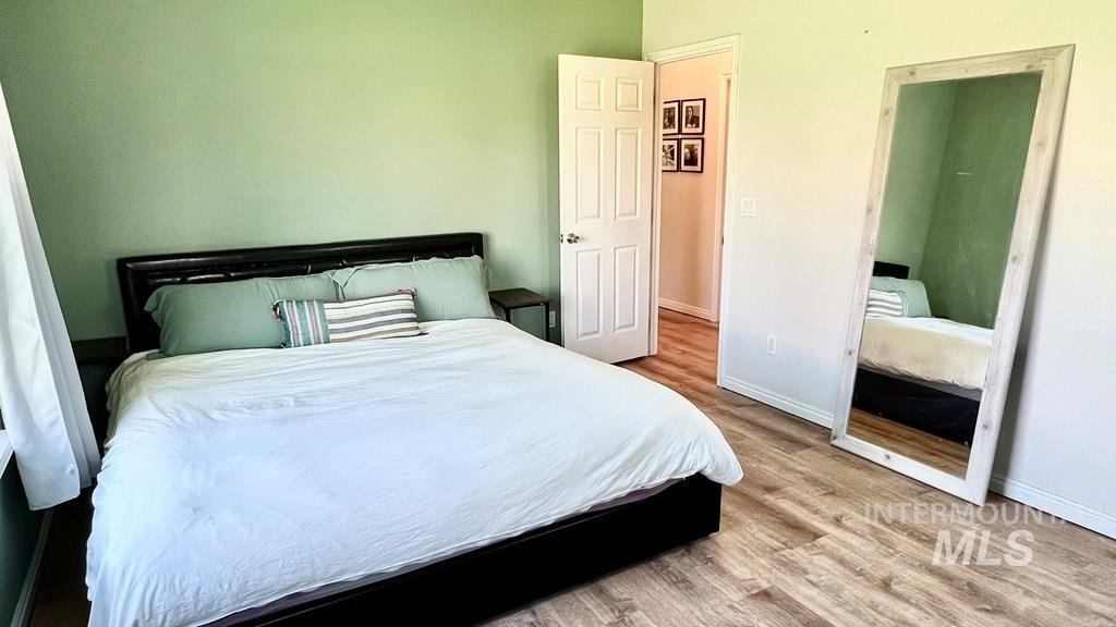 Bedroom featuring light wood-style flooring