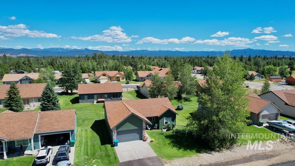 Aerial perspective of suburban area with mountains