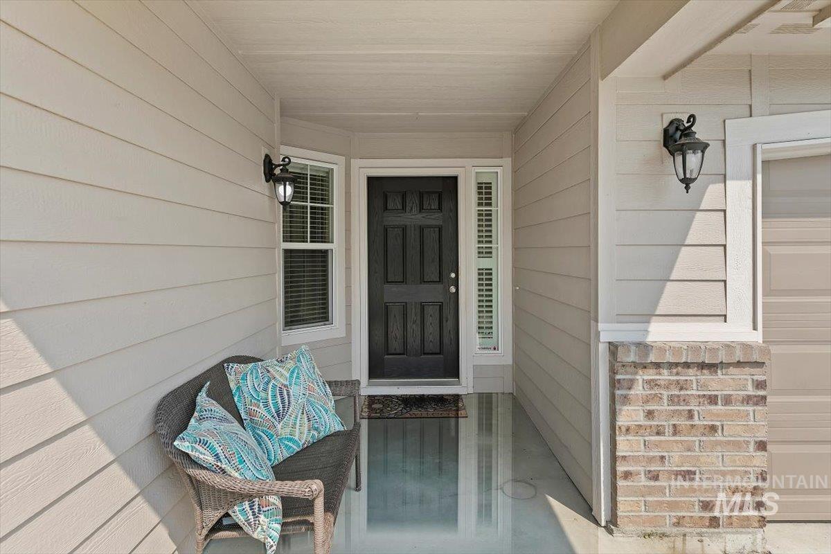 Entrance to property with covered porch