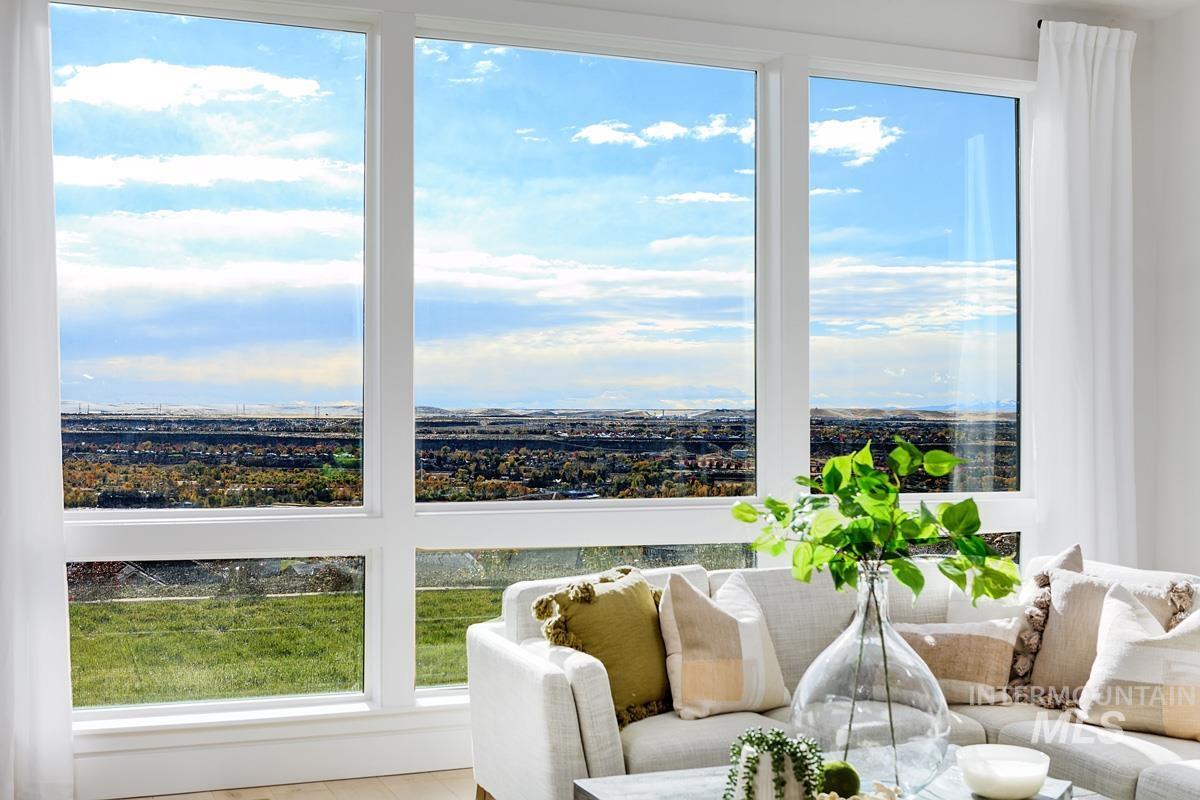 Sunroom featuring plenty of natural light