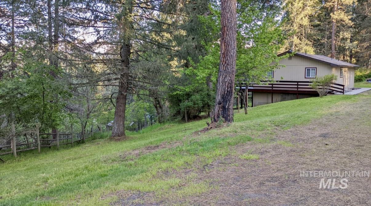 View of yard featuring a deck