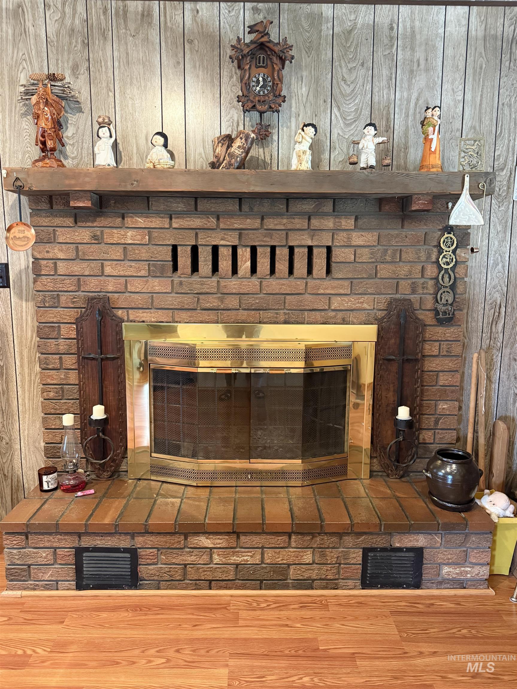Detailed view of wood finished floors and wood walls