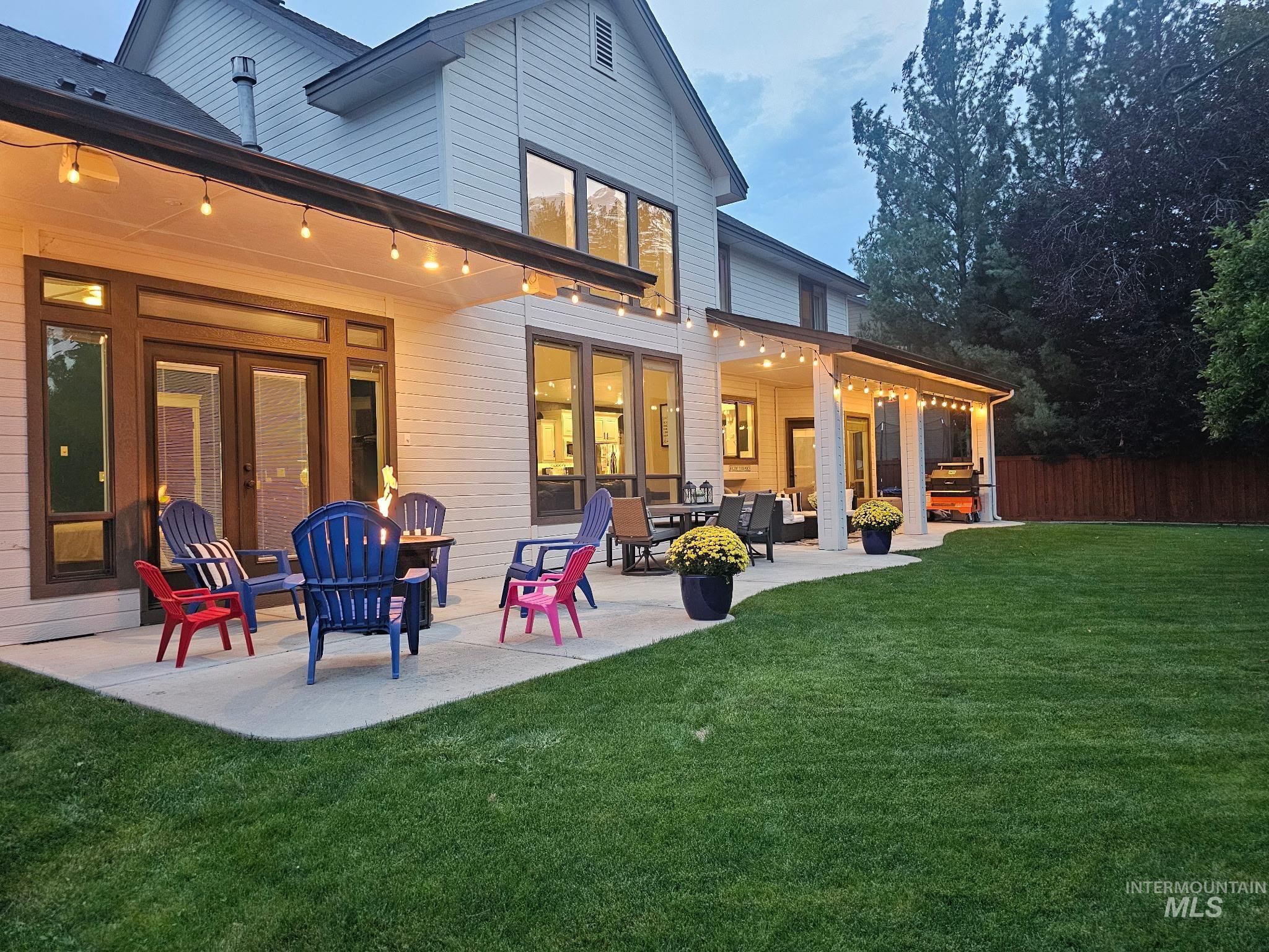 Rear view of house with a patio area and french doors
