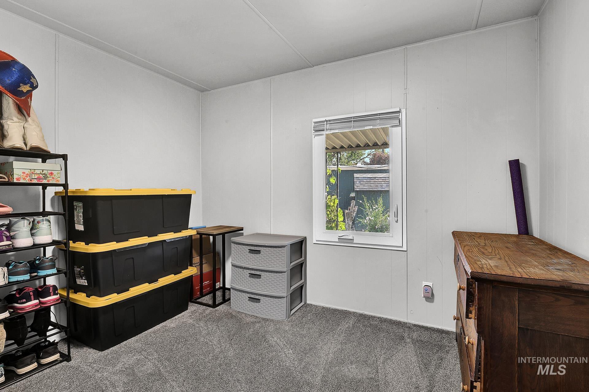 Bedroom featuring carpet flooring