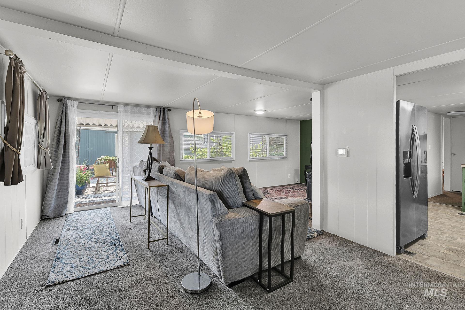 Living area with light carpet