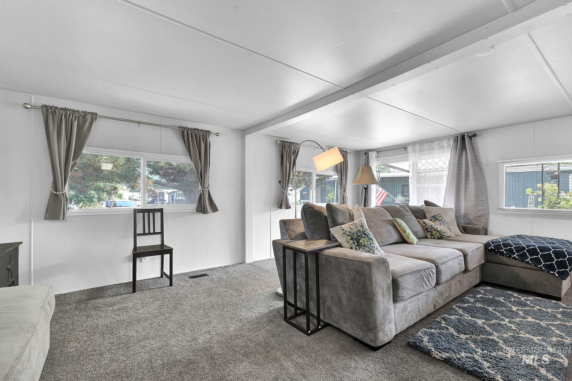 Living area featuring carpet