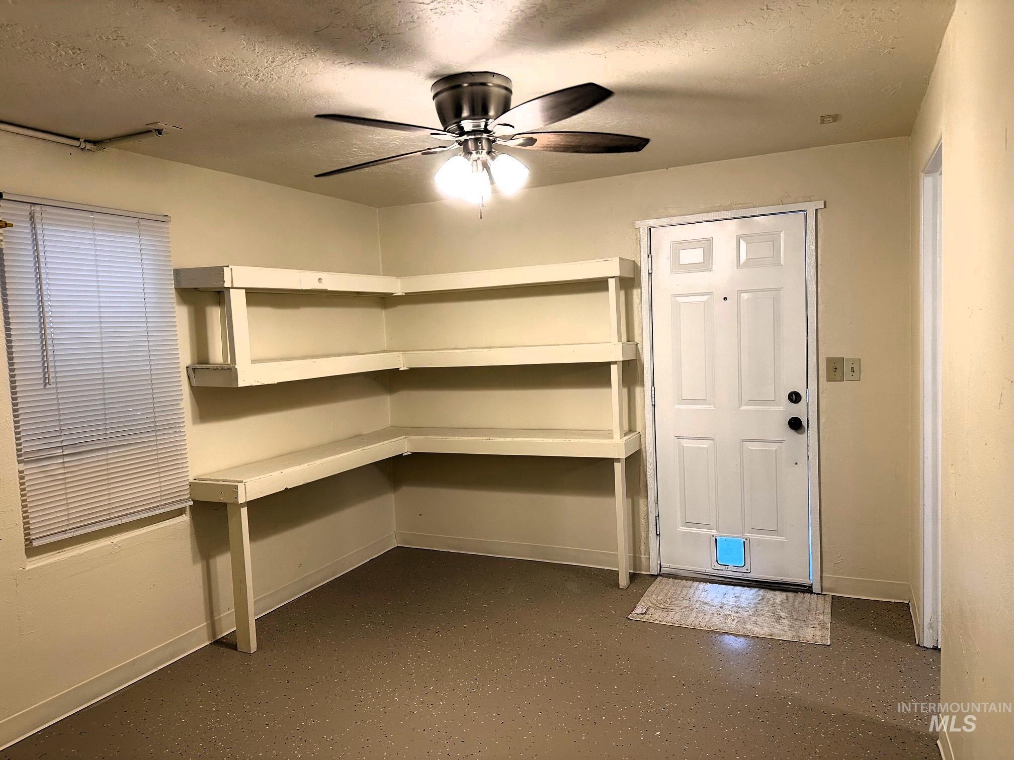 Storage room with a ceiling fan