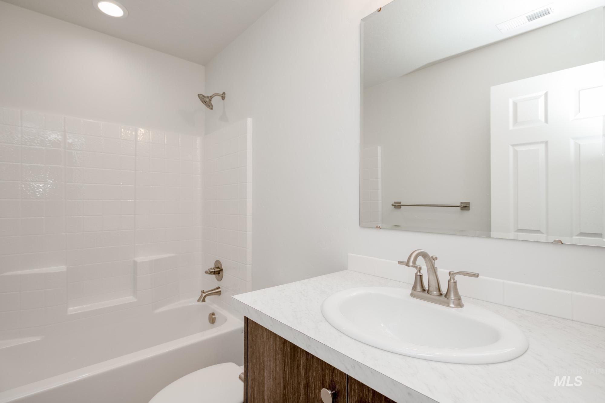 Full bath with tub / shower combination and vanity