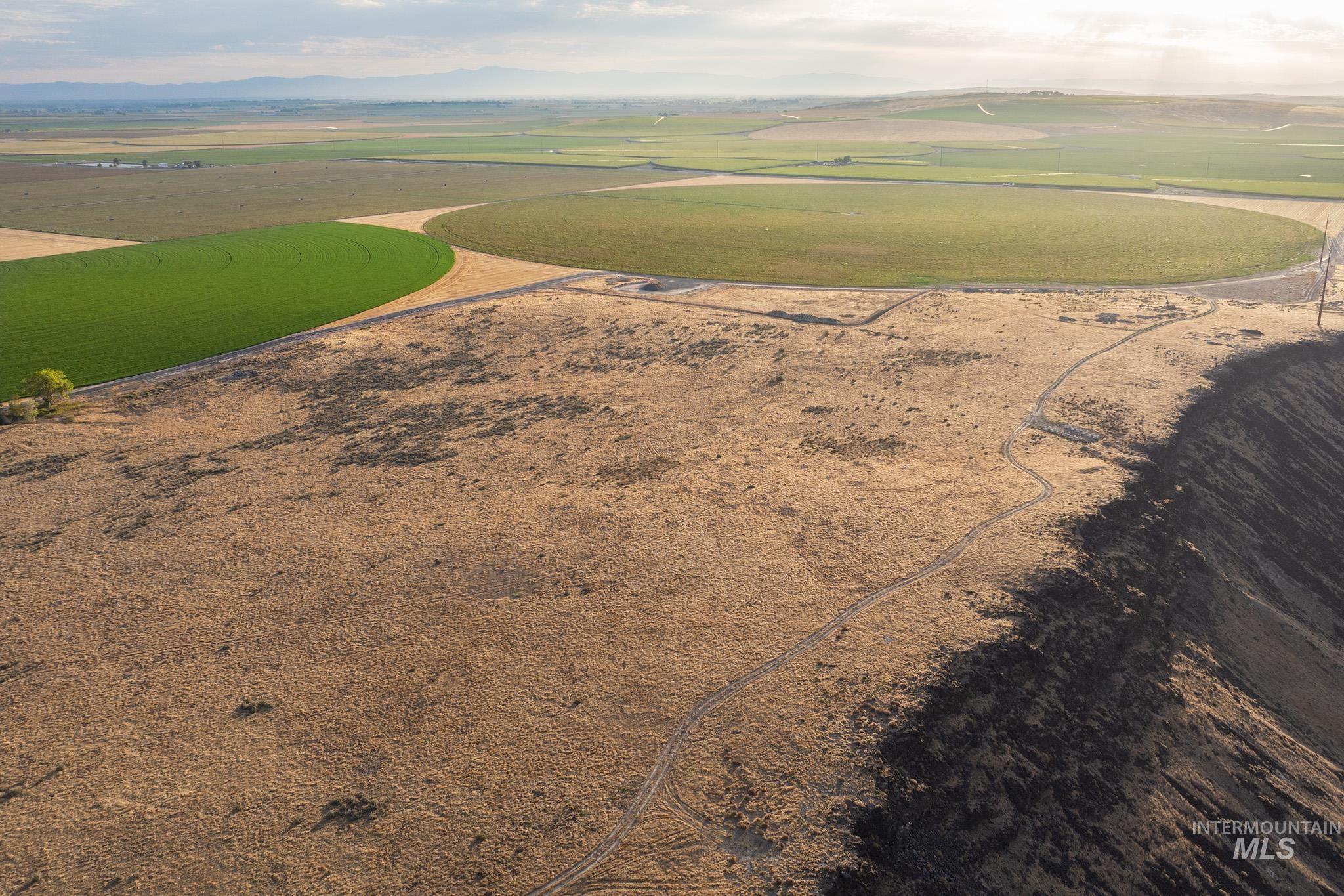 Aerial view of sparsely populated area featuring farmland