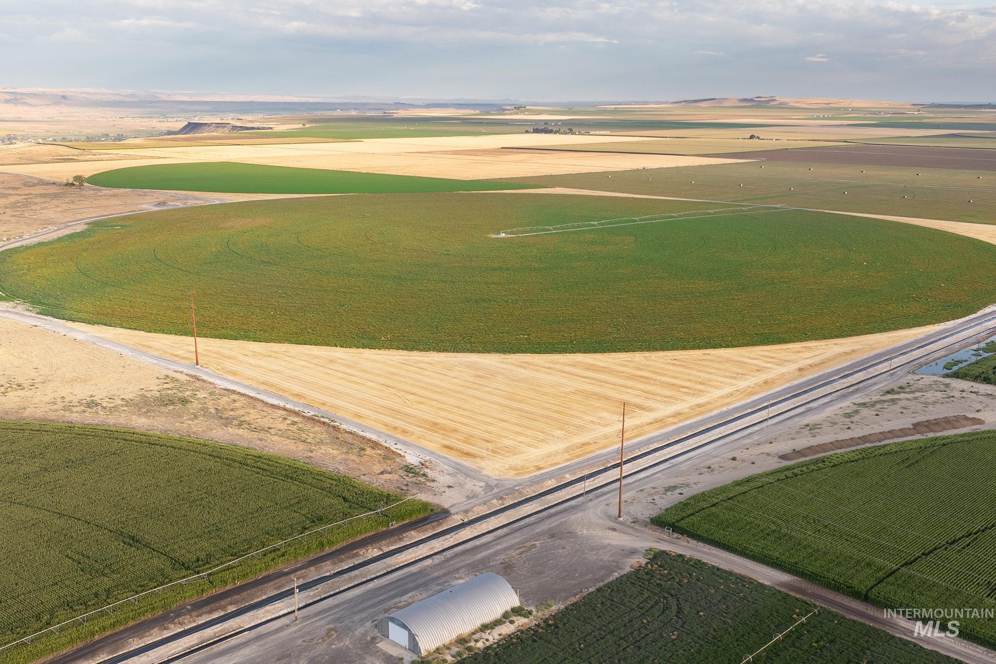 Aerial view of sparsely populated area featuring farmland