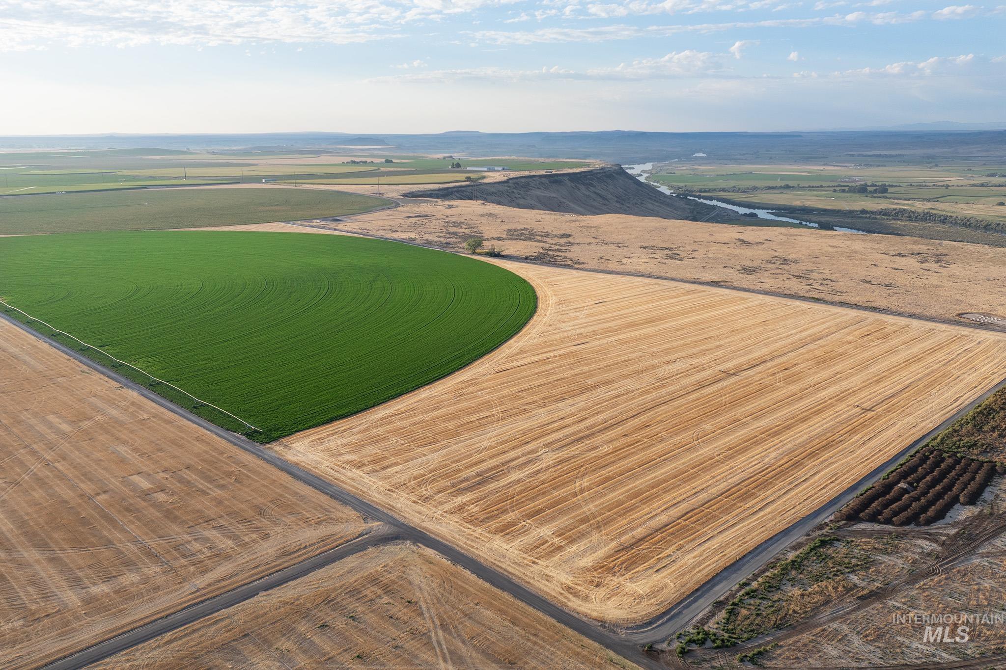 Aerial view of sparsely populated area featuring farmland